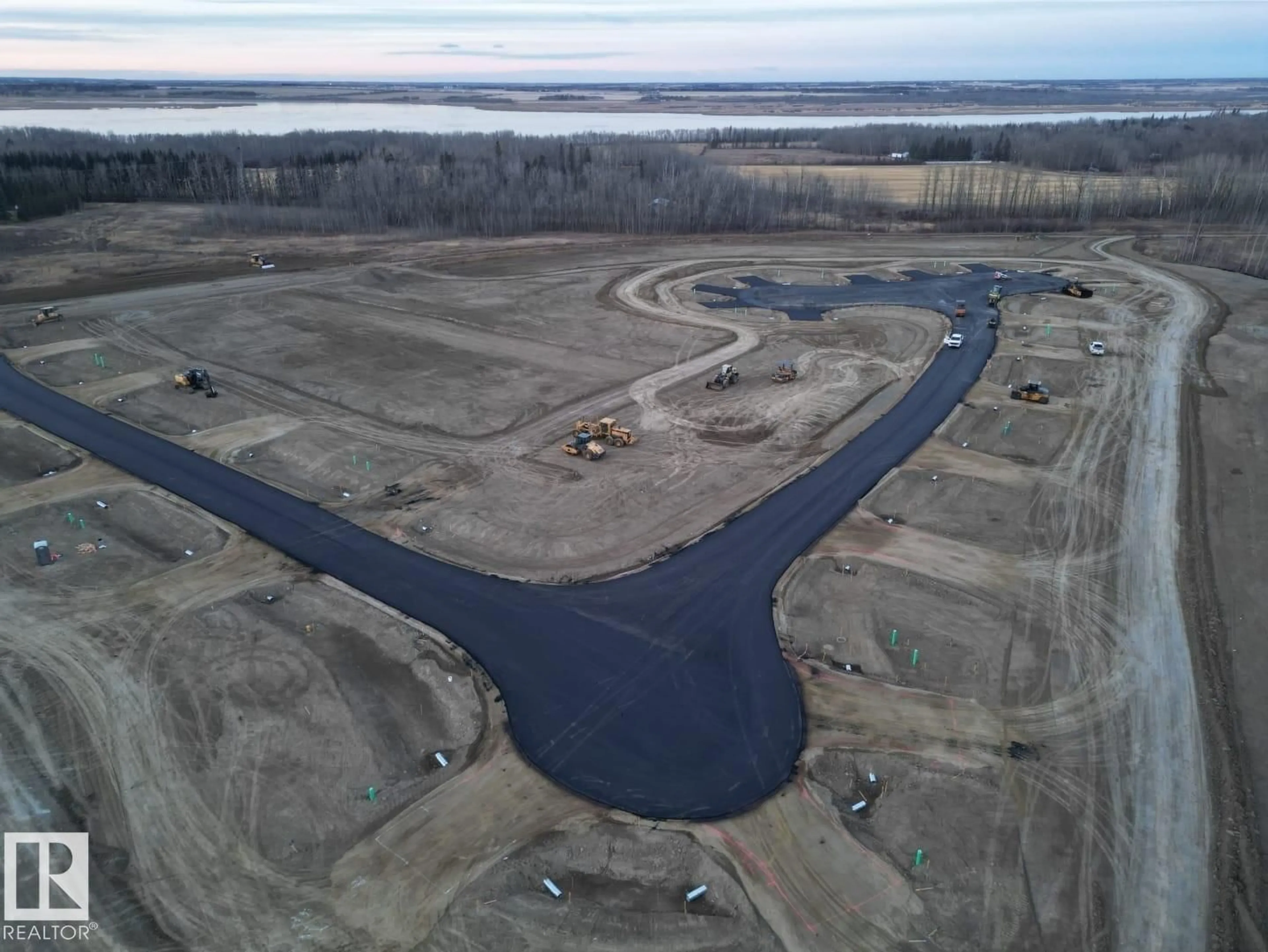 A pic from outside/outdoor area/front of a property/back of a property/a pic from drone, water/lake/river/ocean view for 11 TWP RD 532 A, Rural Parkland County Alberta T7Y1A1