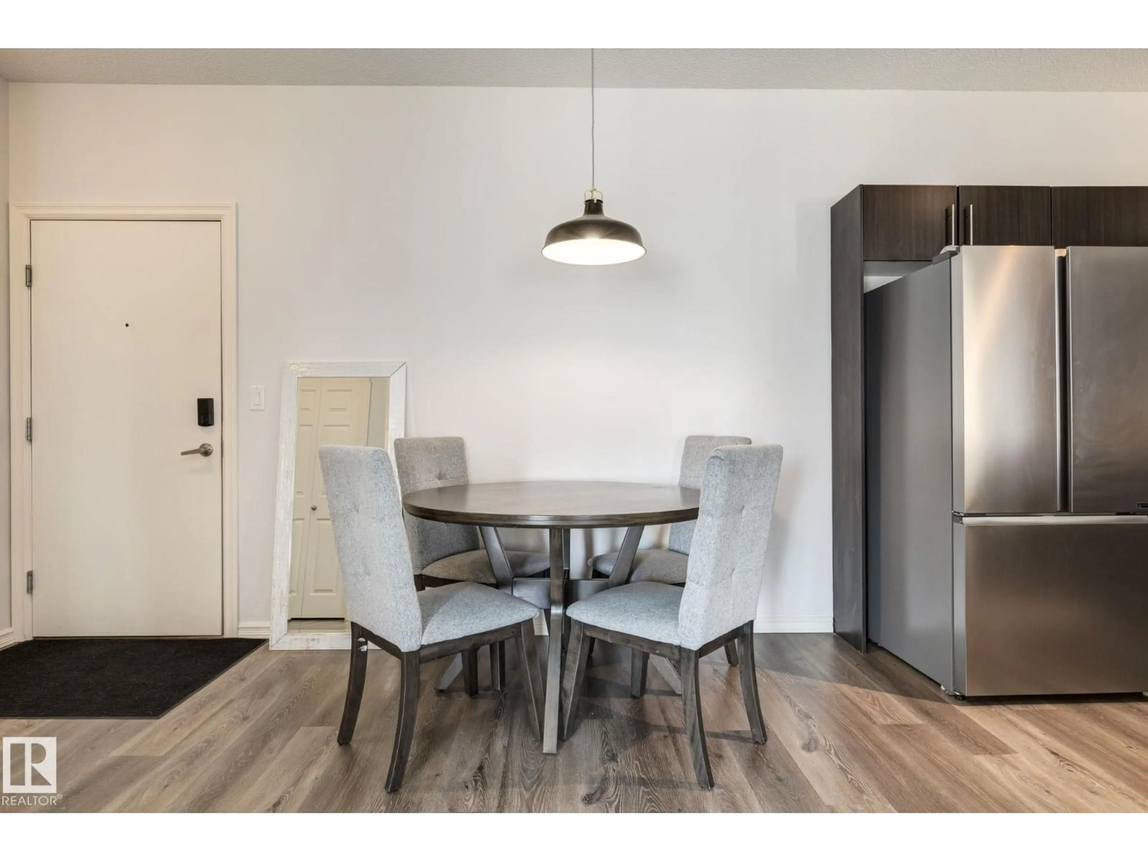 Dining room, wood/laminate floor for 263 - 235 MACEWAN RD, Edmonton Alberta T6W0C4