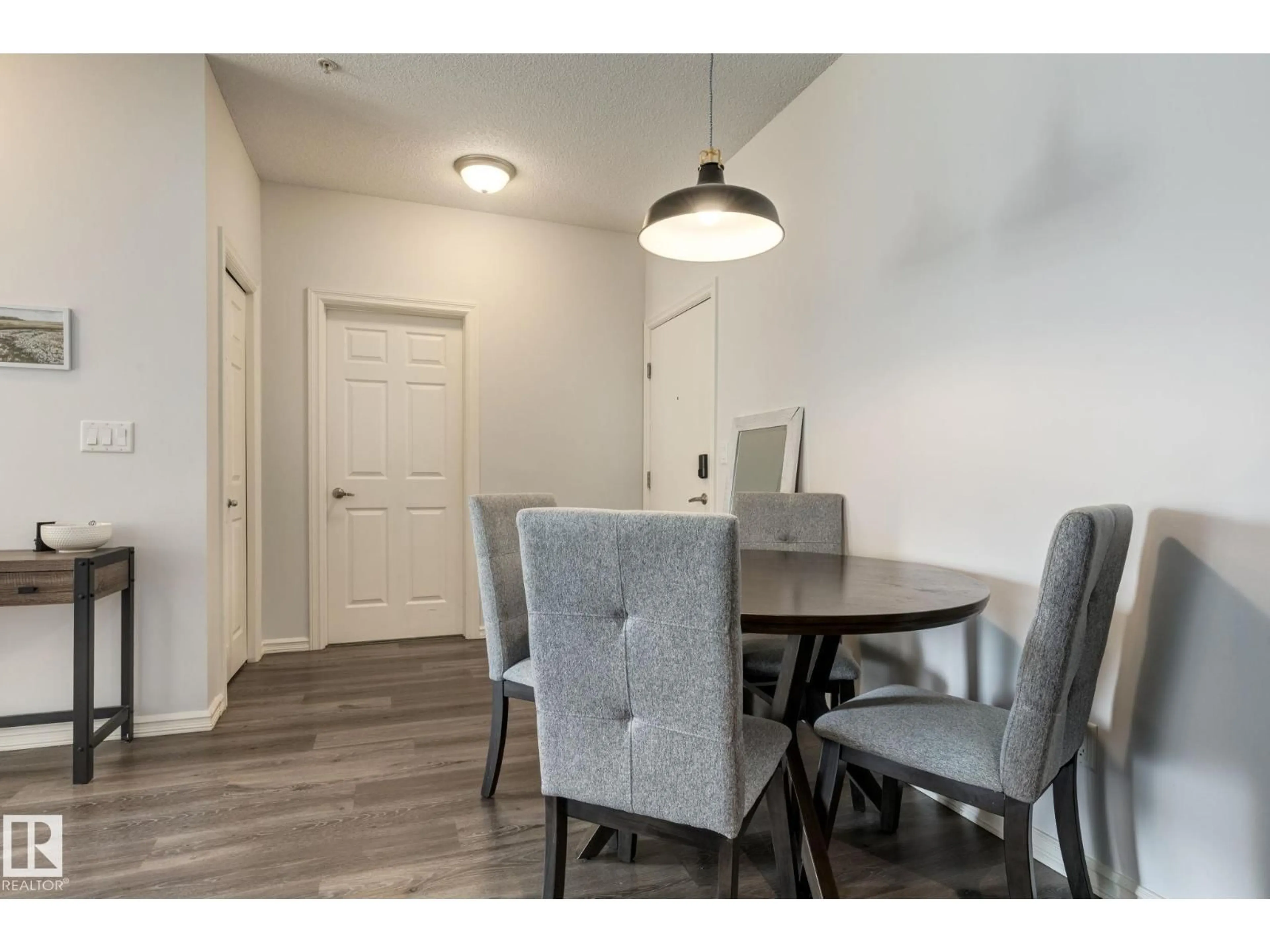 Dining room, wood/laminate floor for 263 - 235 MACEWAN RD, Edmonton Alberta T6W0C4