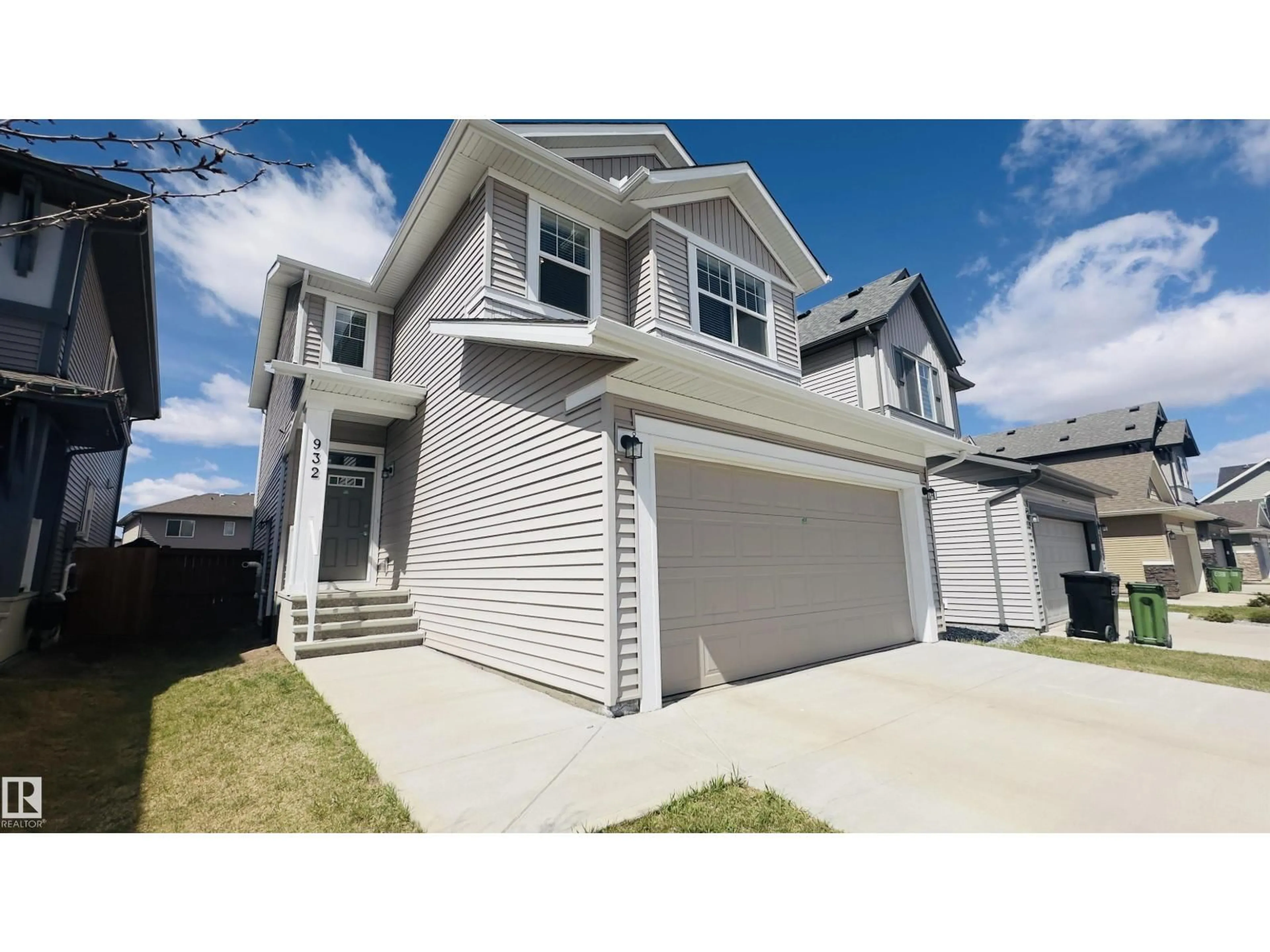 Home with vinyl exterior material, street for 932 MCCONACHIE BLVD, Edmonton Alberta T5Y3X5