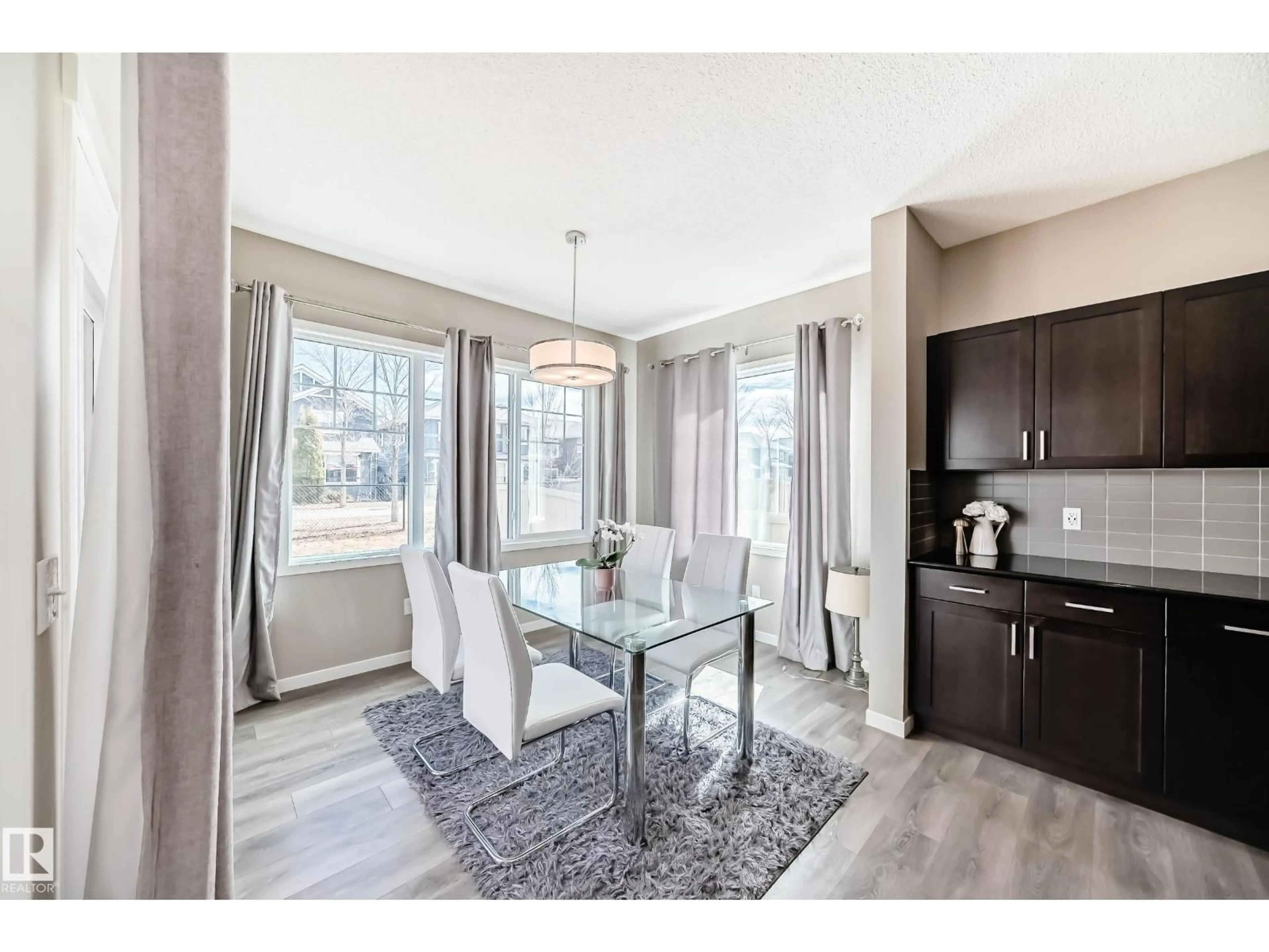 Dining room, wood/laminate floor for LI SW - 5147 CRABAPPLE LINK, Edmonton Alberta T6X1X1