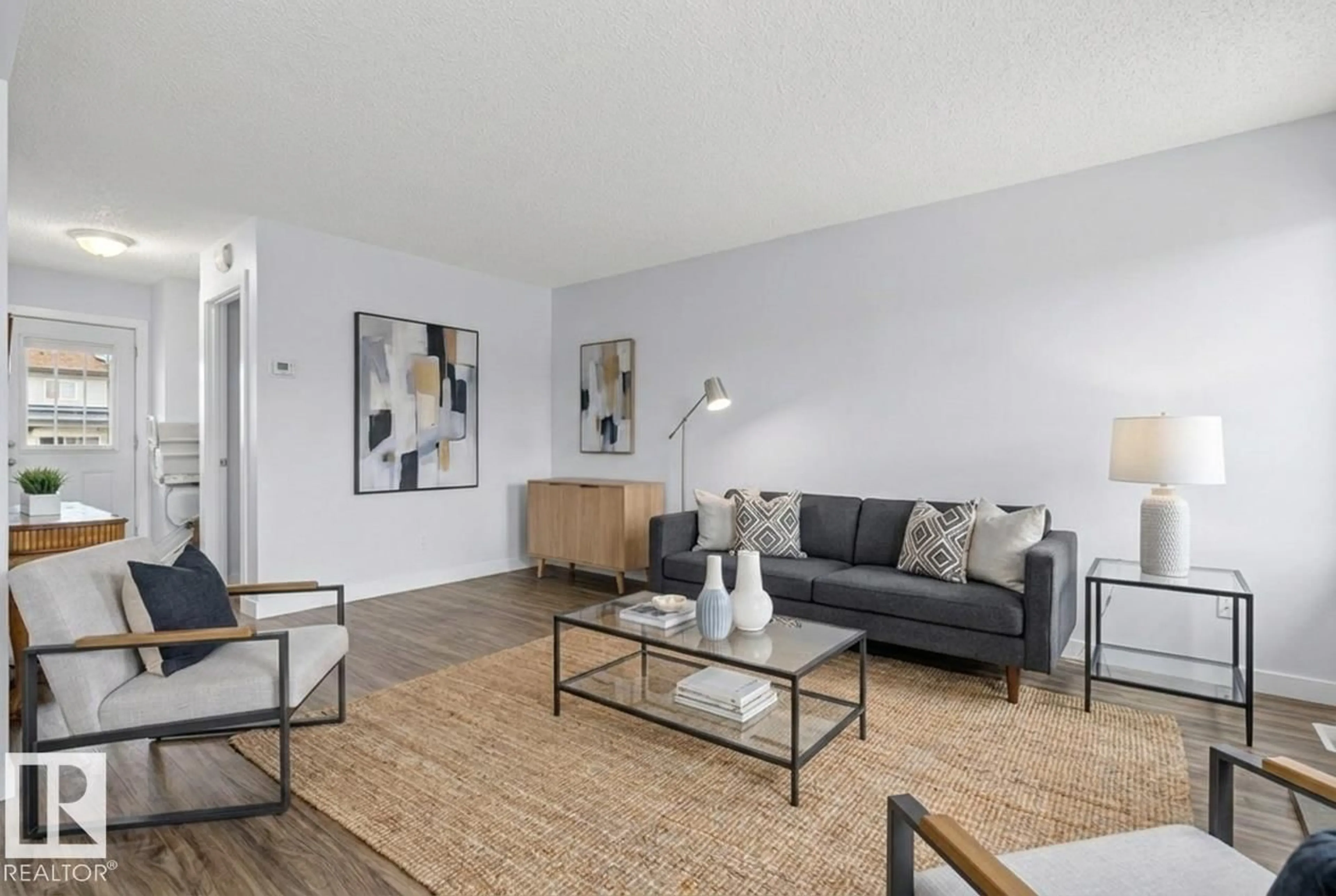Living room with furniture, unknown for 205 13831 24 ST NW, Edmonton Alberta T5Y1K1