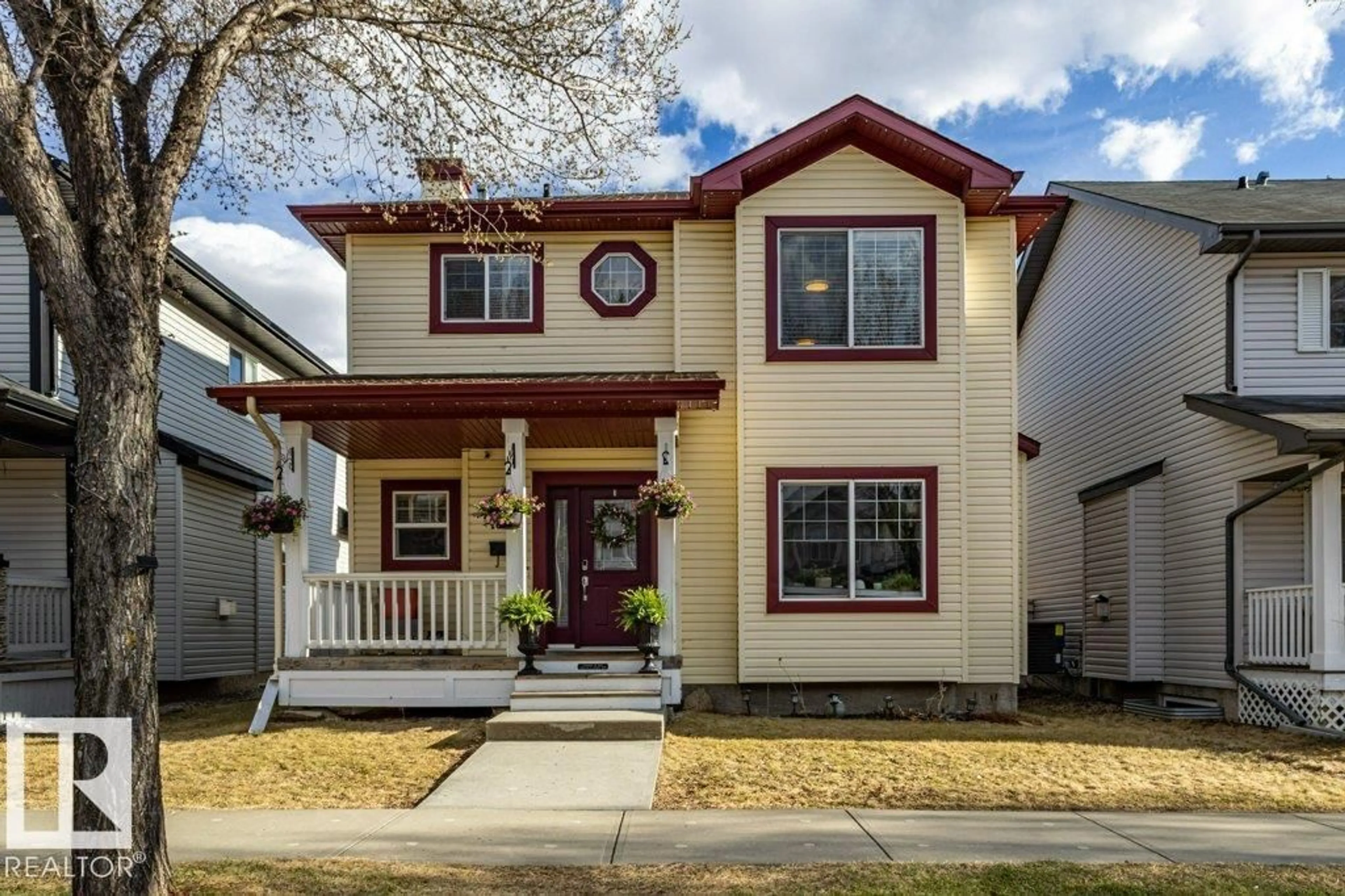 Home with vinyl exterior material, street for 1676 TOMLINSON CM, Edmonton Alberta T6R3J3