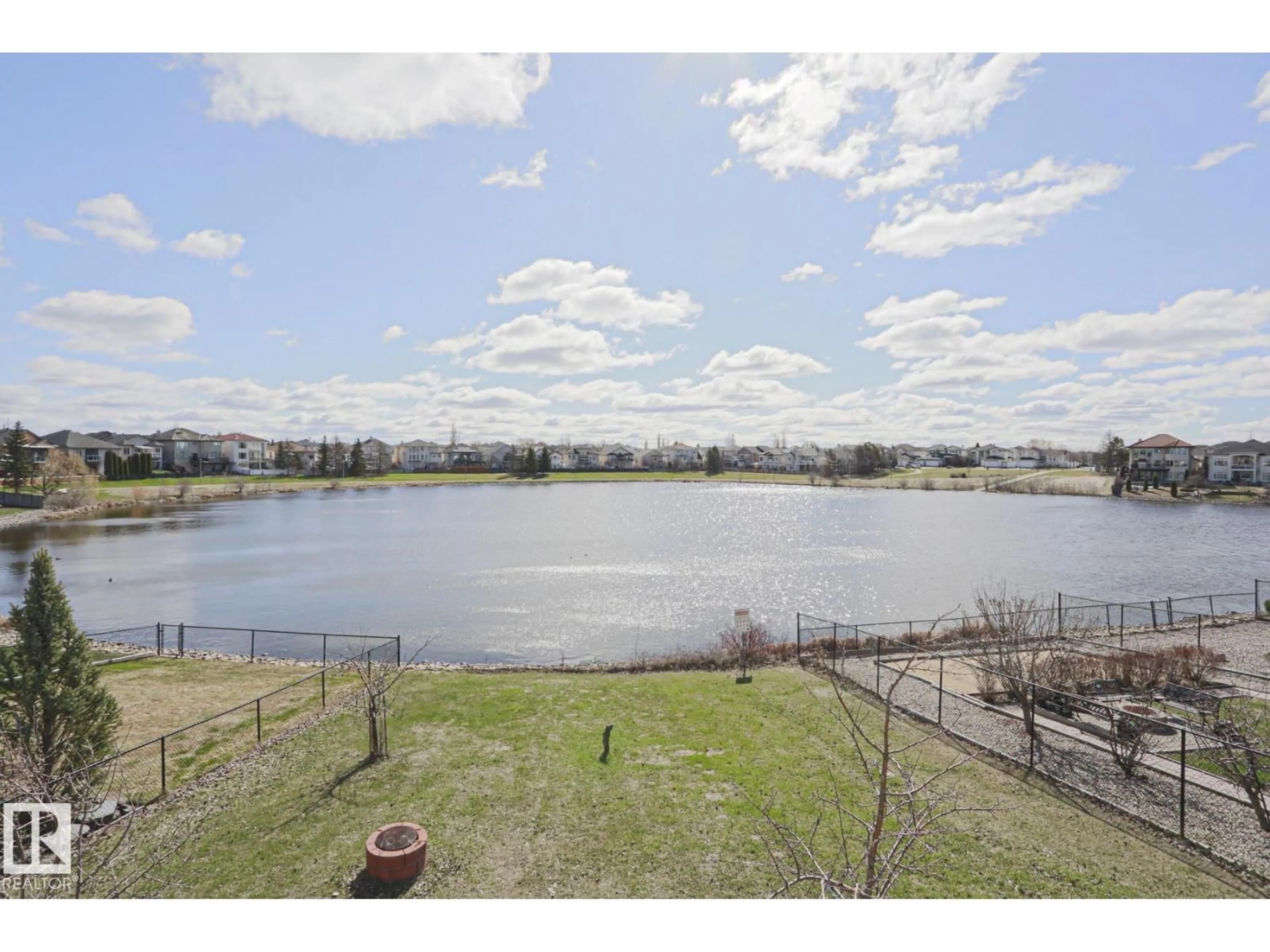 A pic from outside/outdoor area/front of a property/back of a property/a pic from drone, water/lake/river/ocean view for NW - 16203 89 ST, Edmonton Alberta T5Z3M3