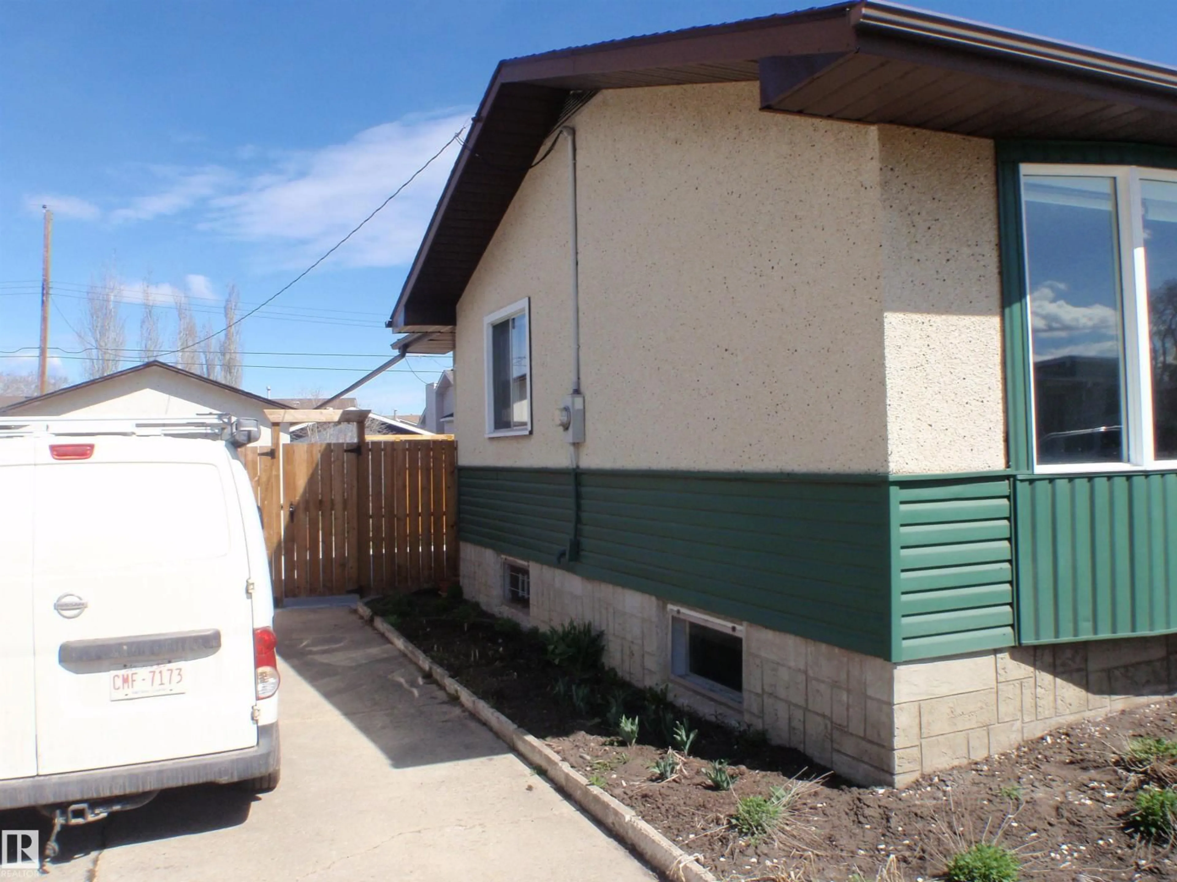Home with vinyl exterior material, street for 4510 57 AV, Barrhead Alberta T7N1K2