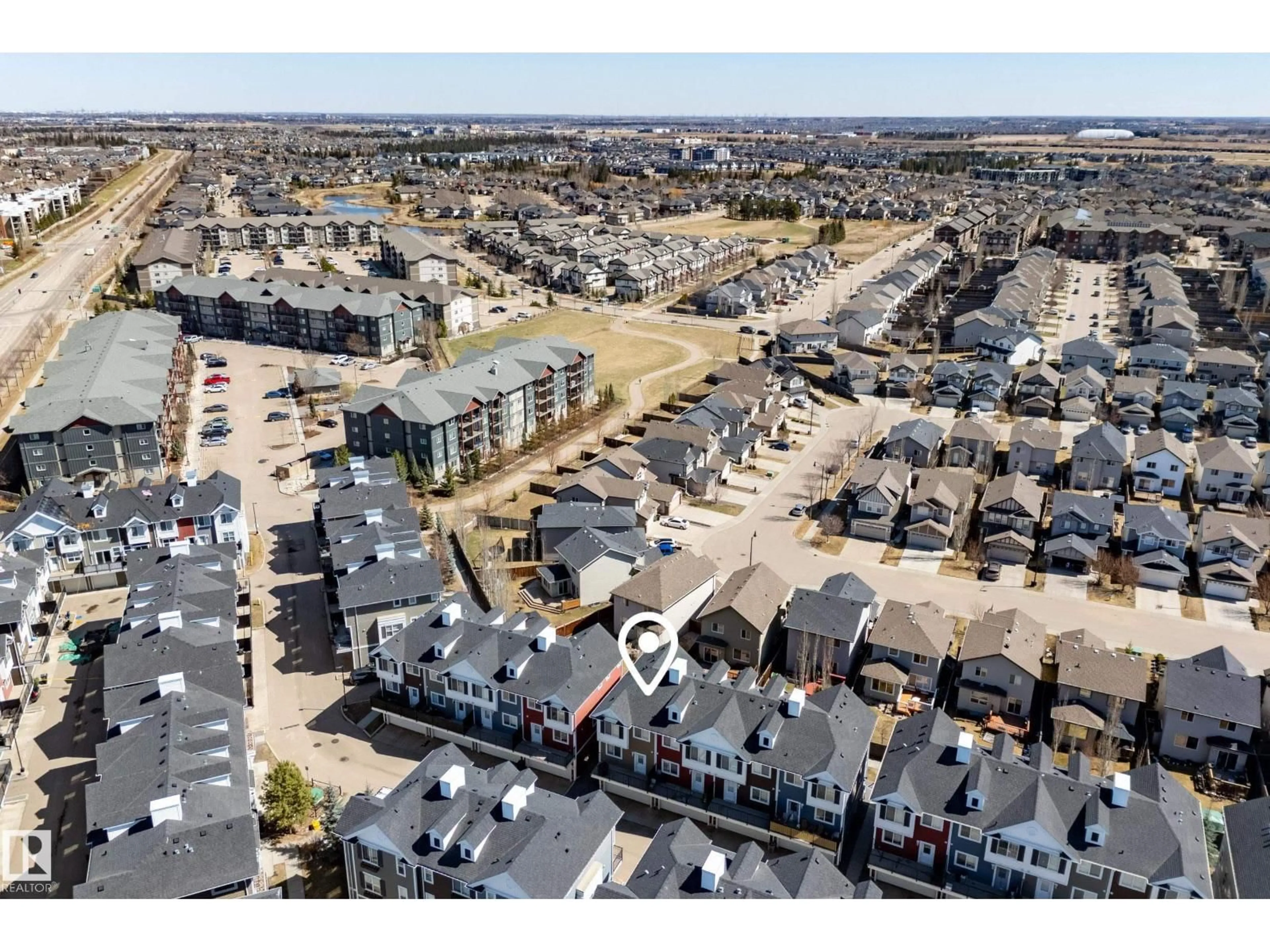 A pic from outside/outdoor area/front of a property/back of a property/a pic from drone, street for #61 - 2803 JAMES MOWATT TR, Edmonton Alberta T6W2P5