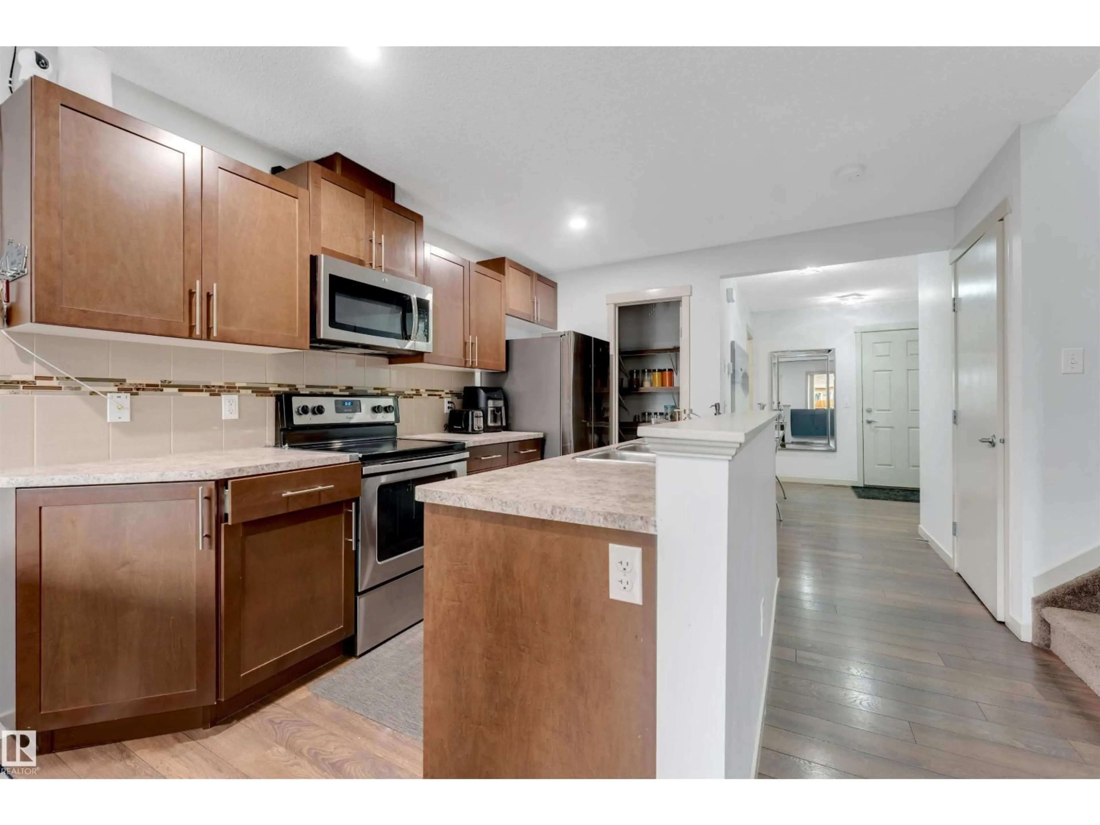 Open concept kitchen, unknown for 3048 16 AV, Edmonton Alberta T6T0T9