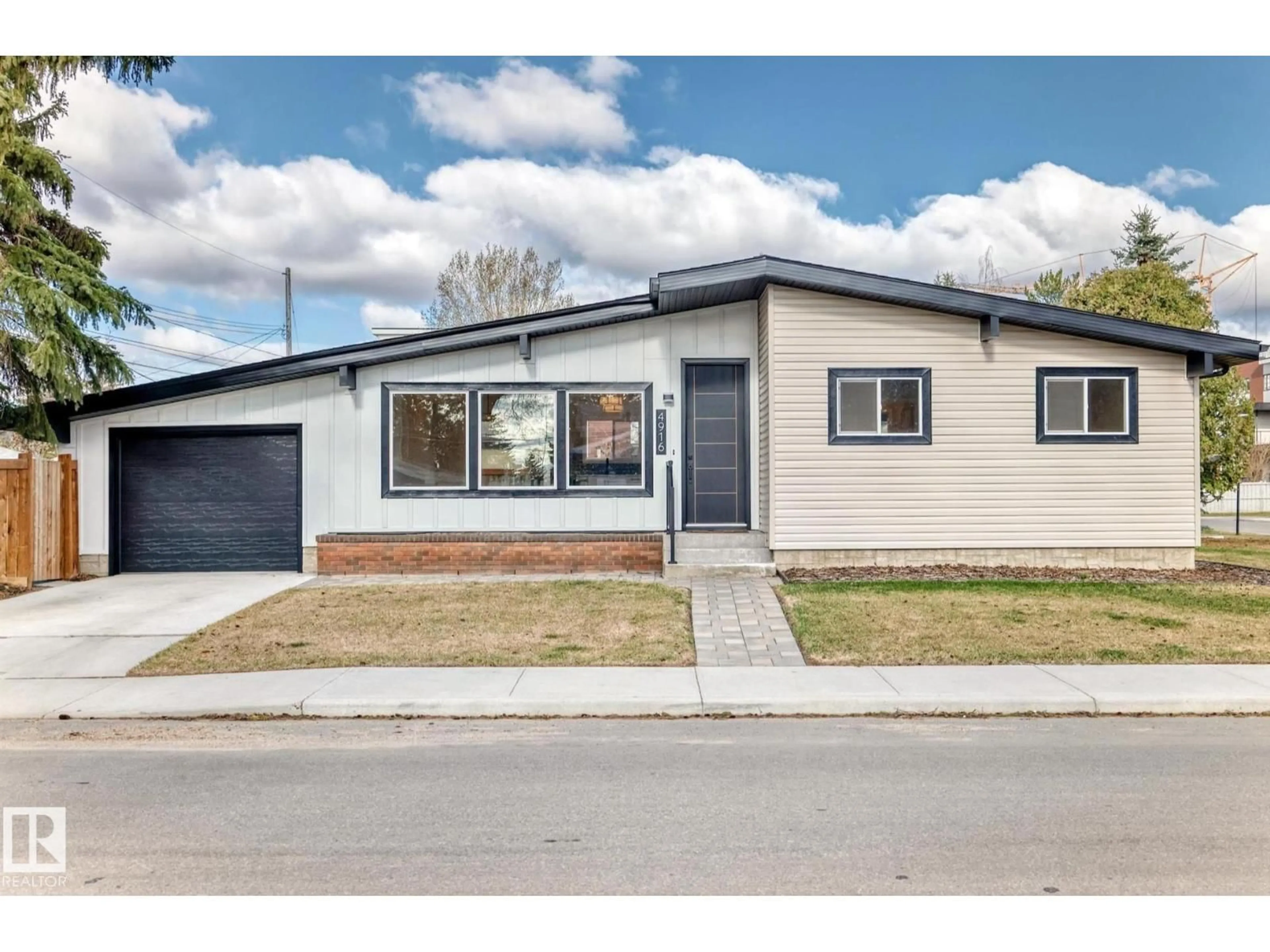 Home with vinyl exterior material, street for NW - 4916 116A ST, Edmonton Alberta T6H3R6