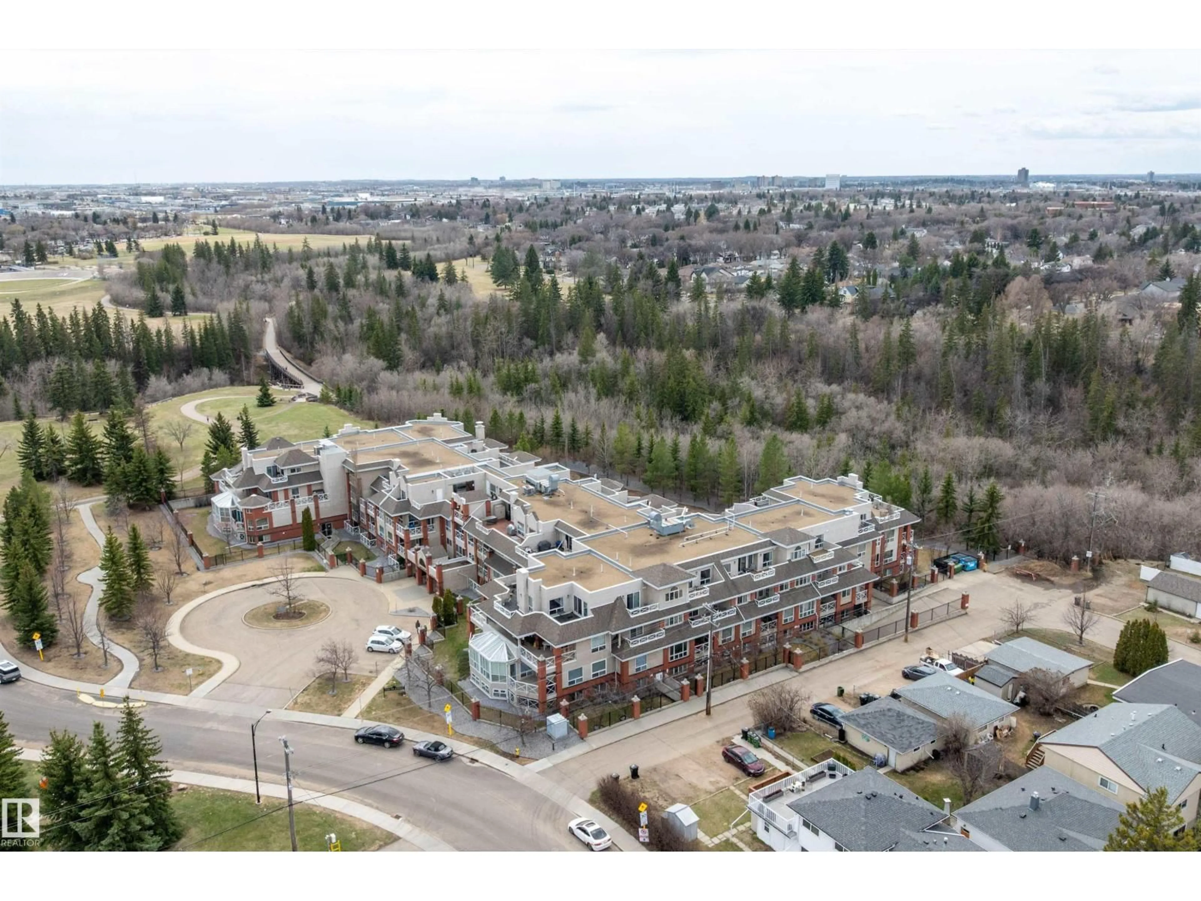 A pic from outside/outdoor area/front of a property/back of a property/a pic from drone, unknown for 202 - 7510 89 ST, Edmonton Alberta T6C0X5
