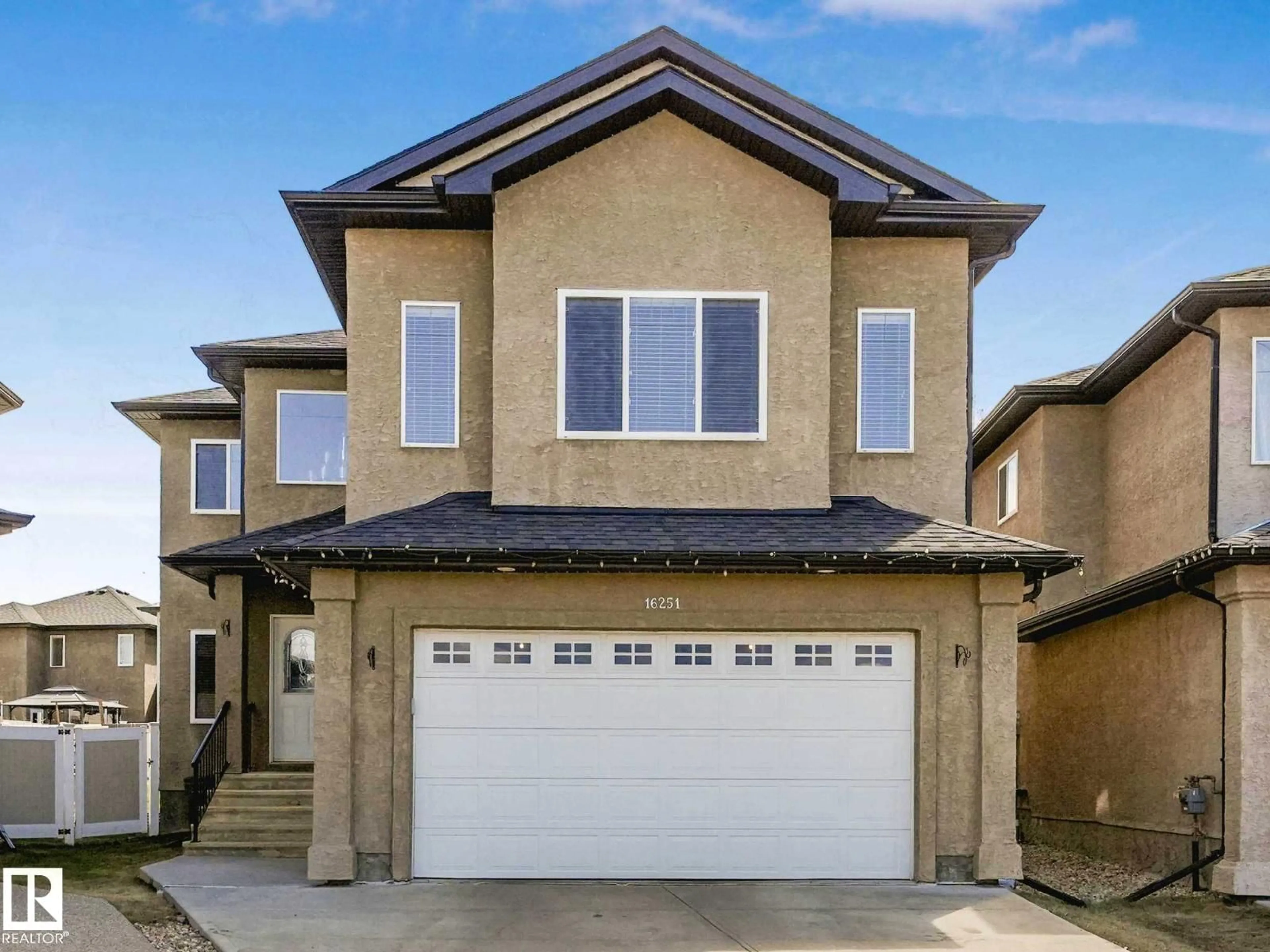 Home with vinyl exterior material, street for NW - 16251 135 ST, Edmonton Alberta T6V0G3