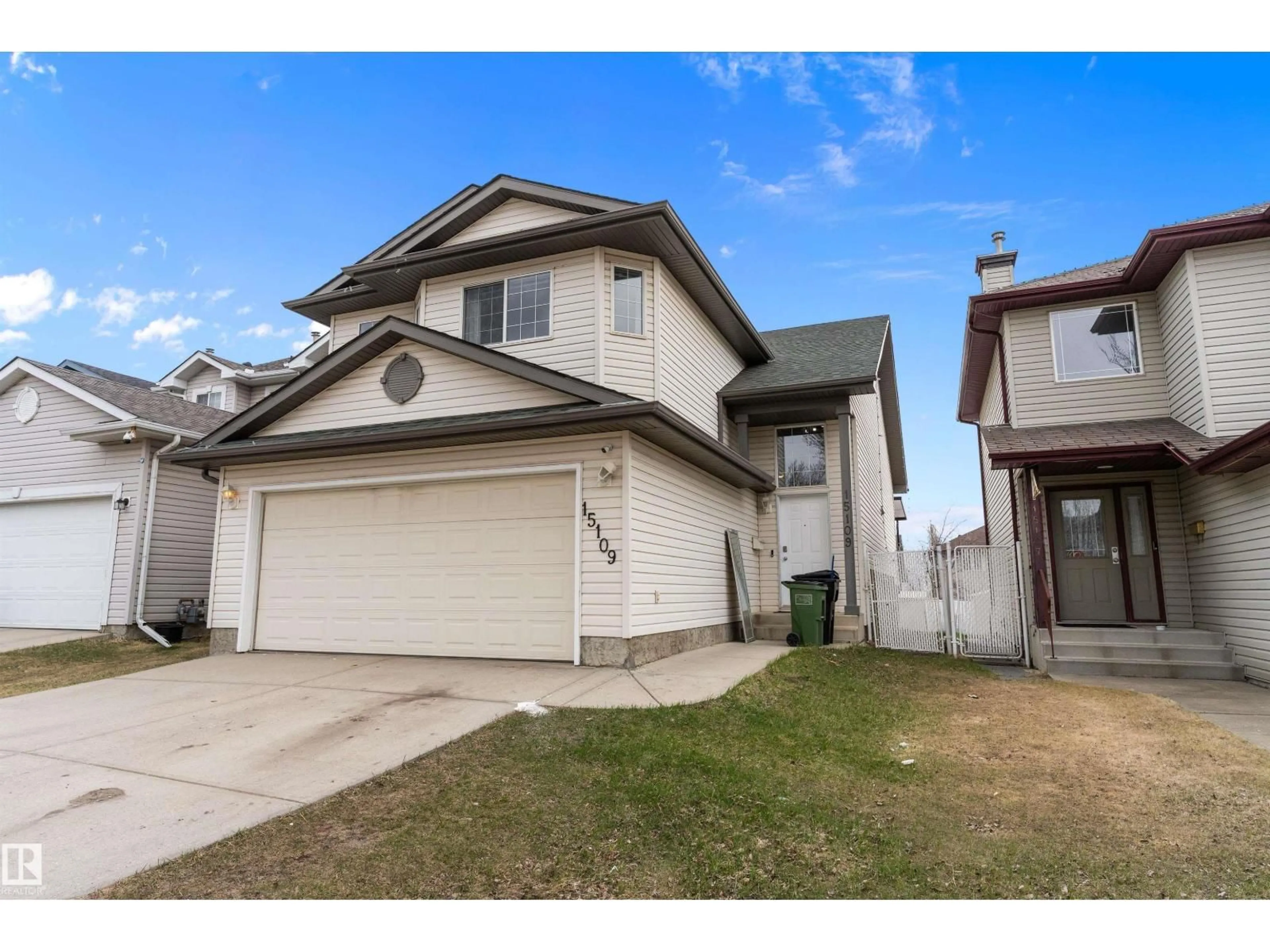 Home with vinyl exterior material, street for 15109 MILLER BV, Edmonton Alberta T5Y3A1