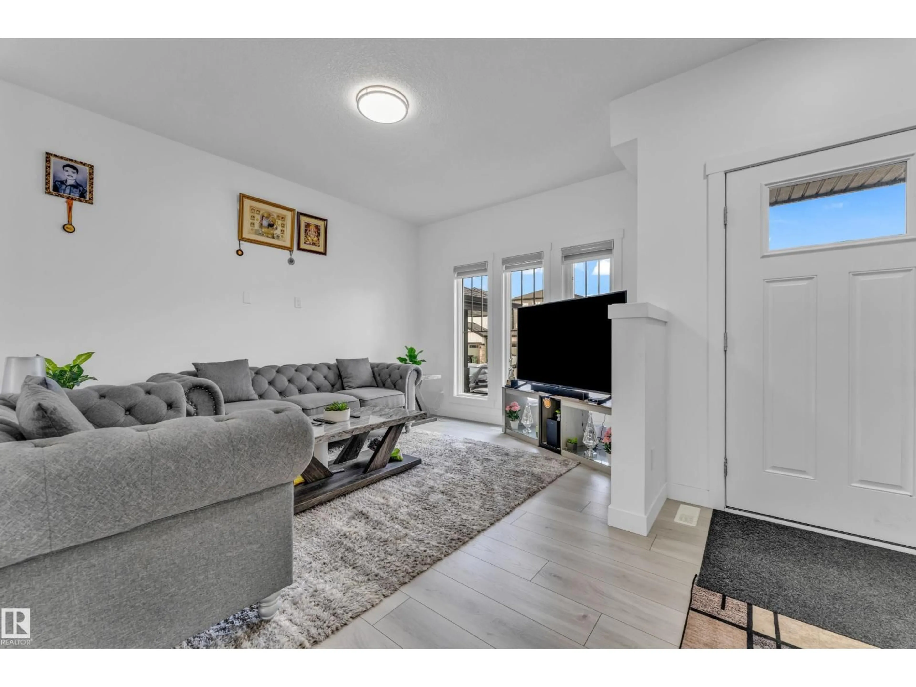 Living room with furniture, unknown for 3016 4 ST, Edmonton Alberta T6T2S9