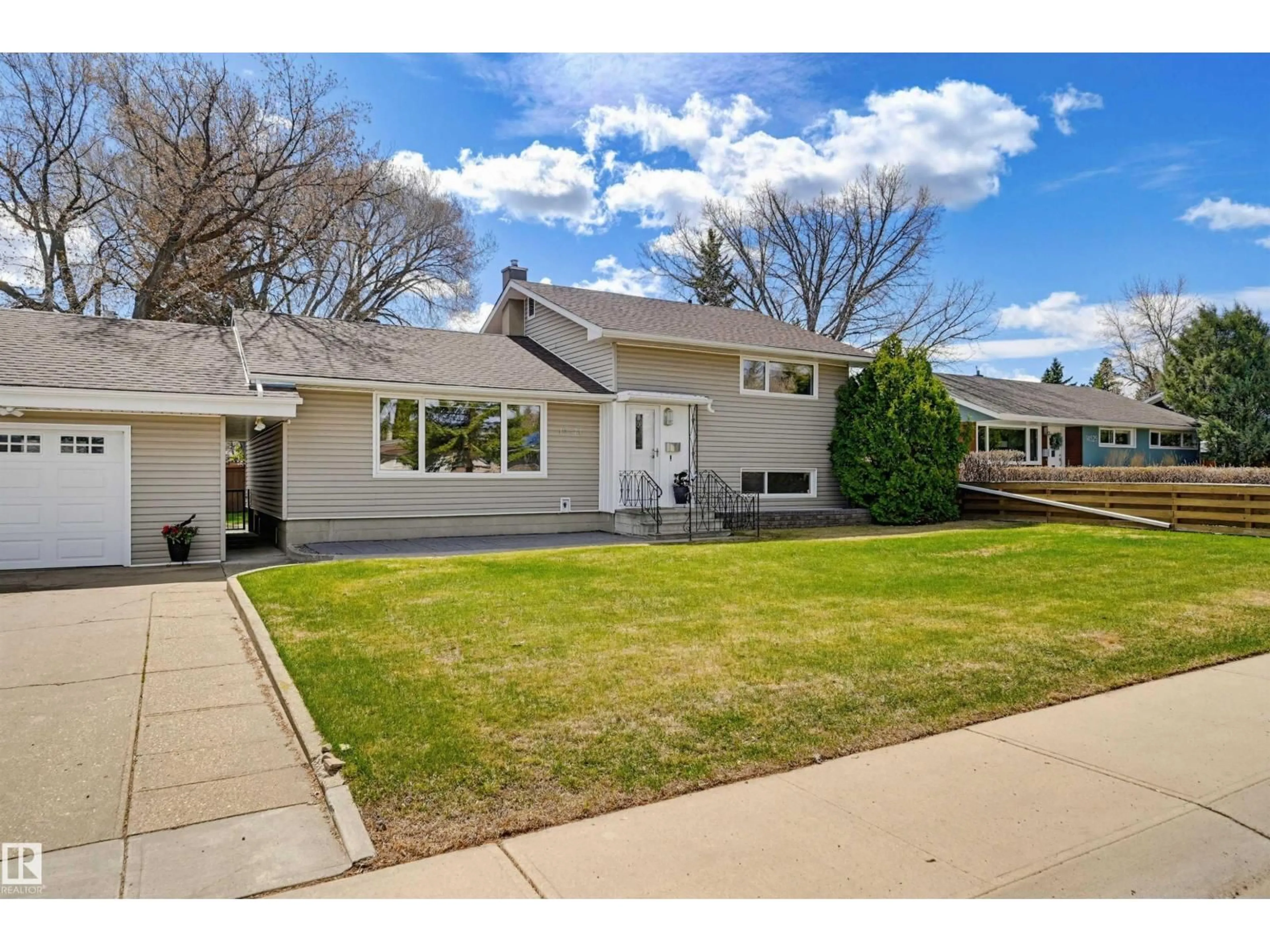 Home with vinyl exterior material, street for 14521 85 AV, Edmonton Alberta T5R3Z5