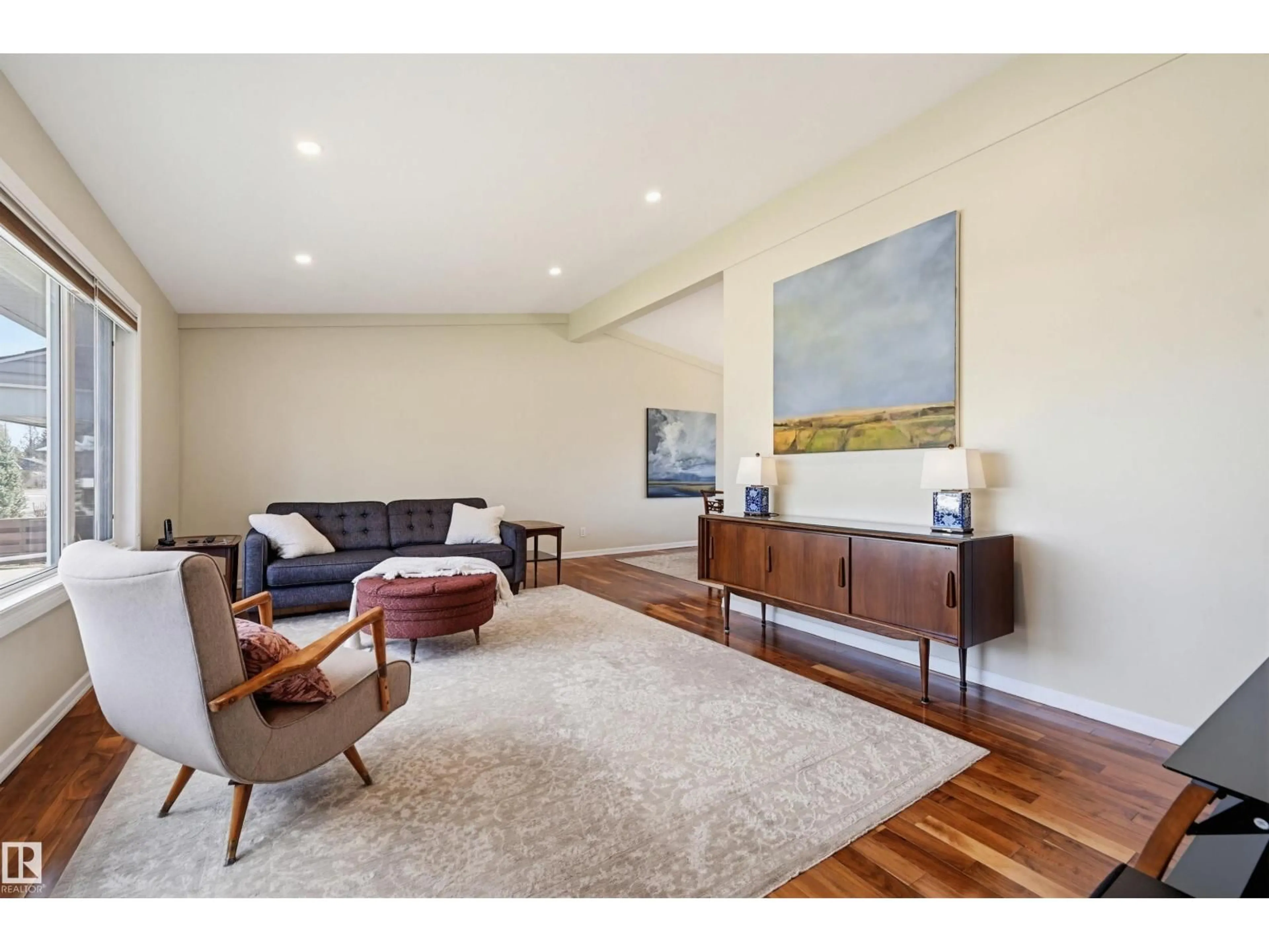 Living room with furniture, wood/laminate floor for 14521 85 AV, Edmonton Alberta T5R3Z5