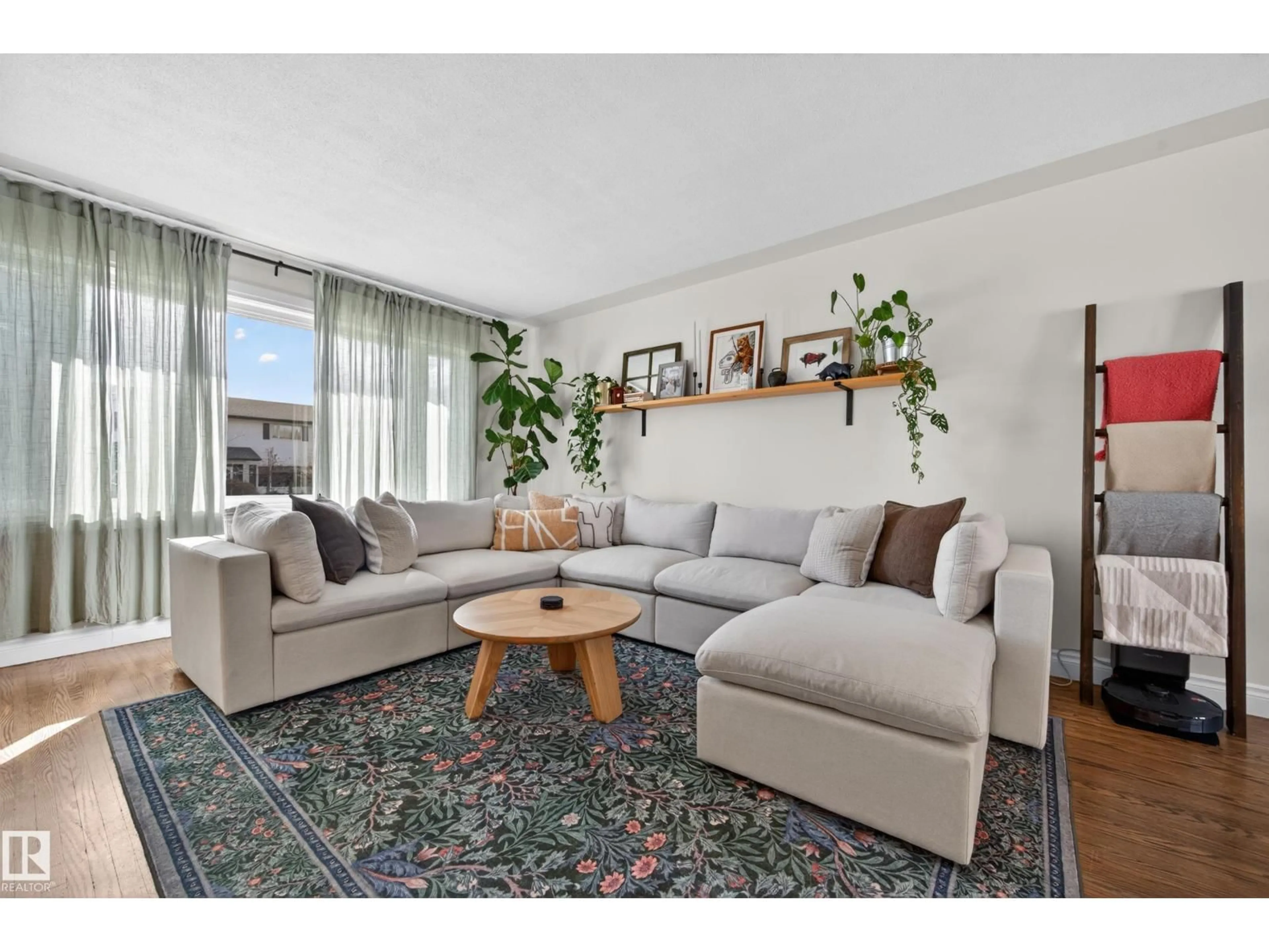 Living room with furniture, unknown for 10740 44 ST, Edmonton Alberta T6A1W4