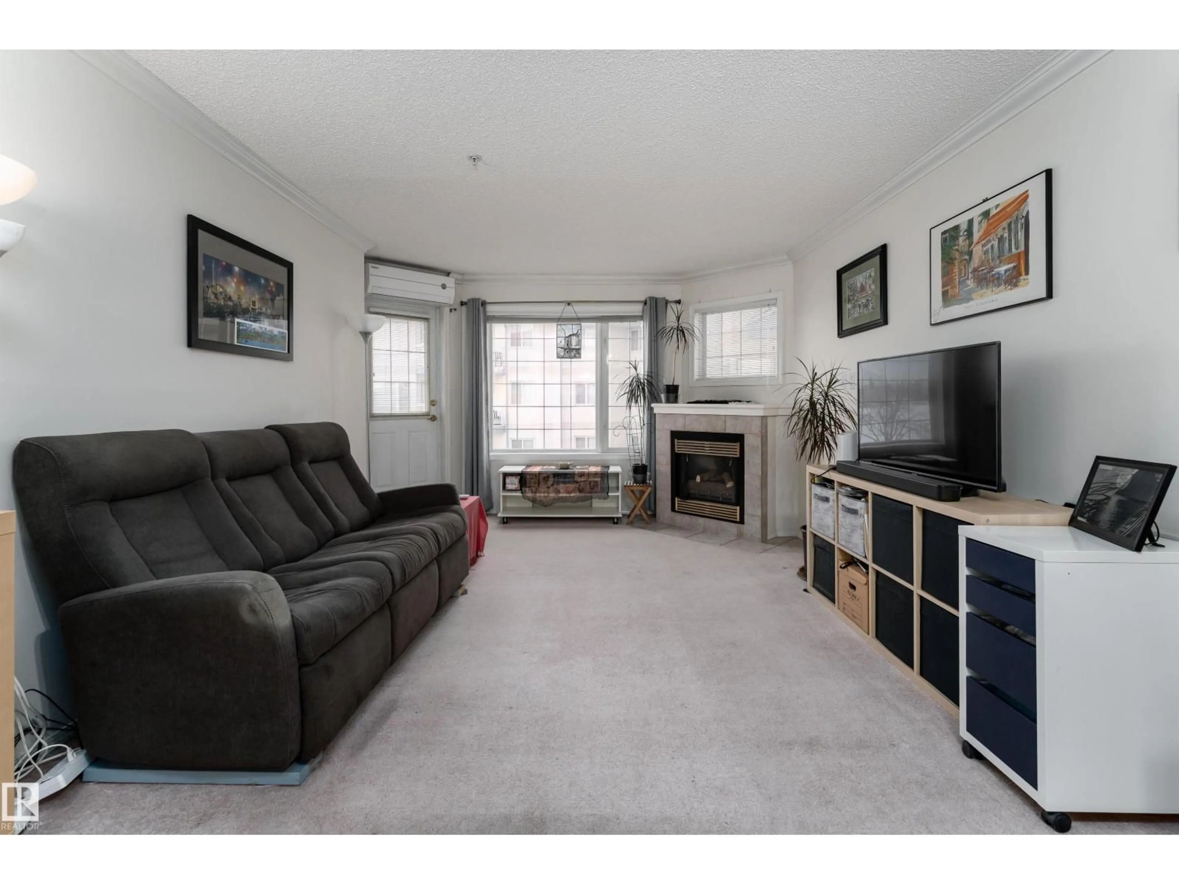 Living room with furniture, unknown for #309 - 13540 114 AV, Edmonton Alberta T5M4C4