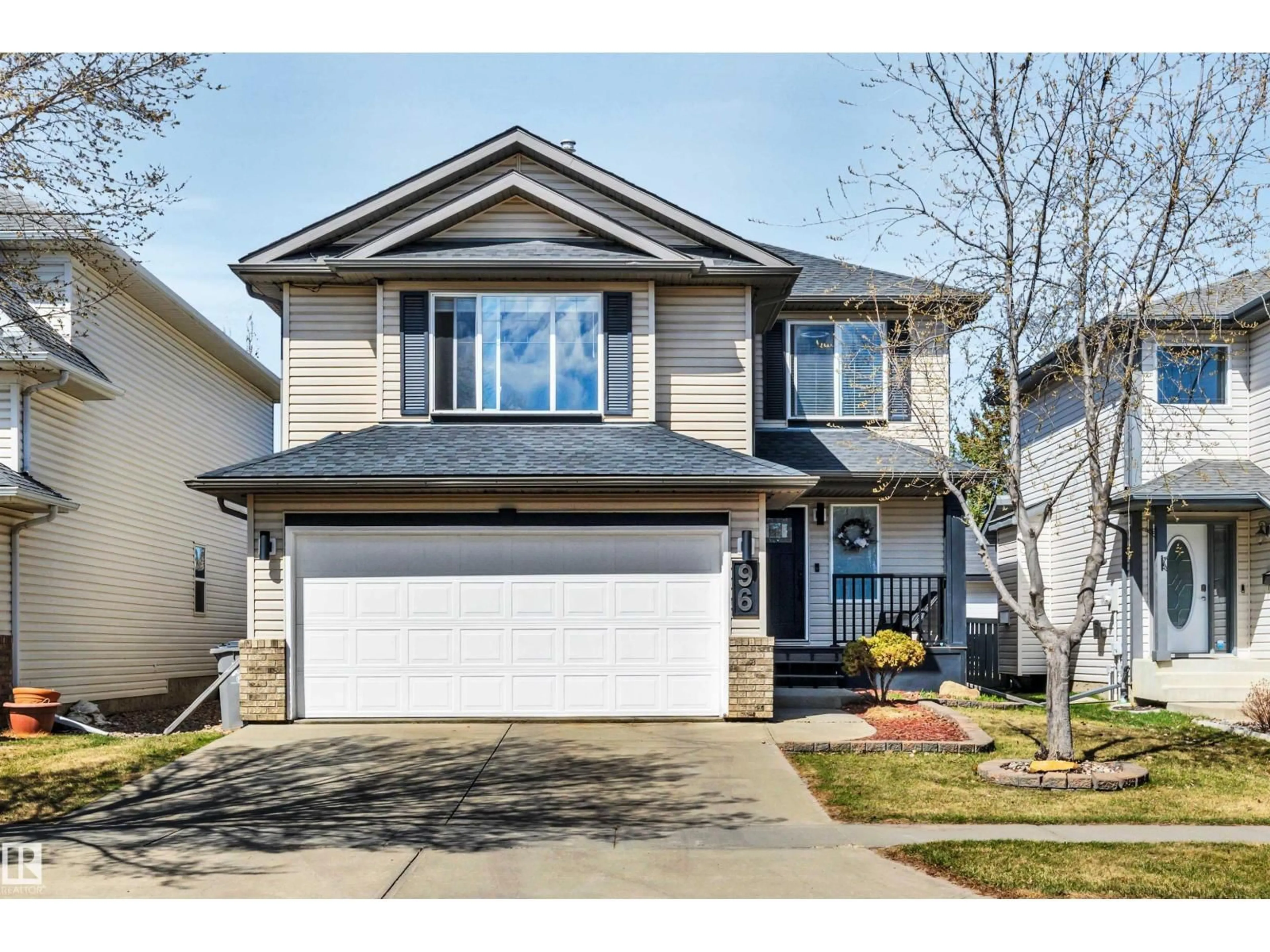 Home with vinyl exterior material, street for 96 BONIN CR, Beaumont Alberta T4X1N7