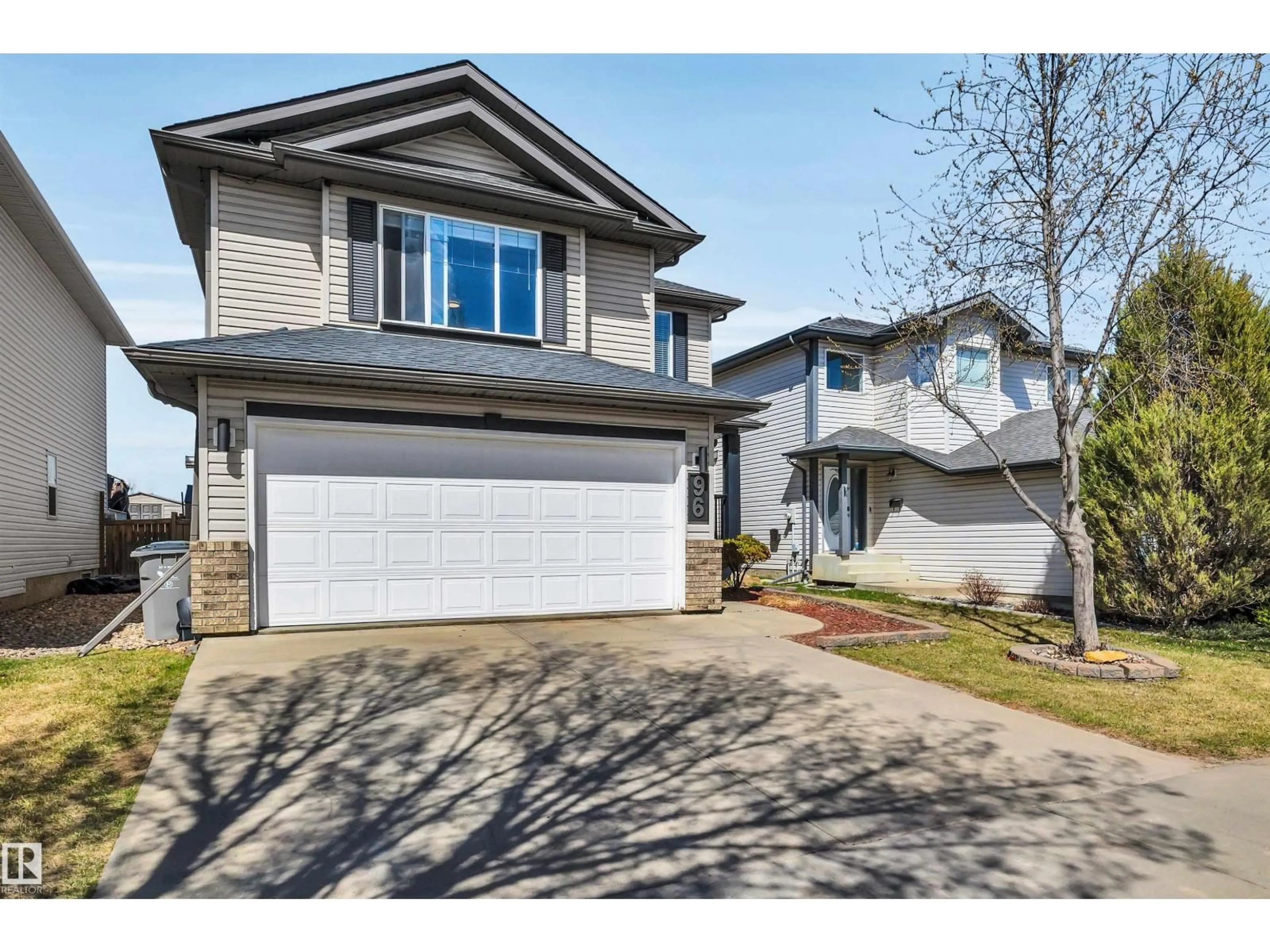 Home with vinyl exterior material, street for 96 BONIN CR, Beaumont Alberta T4X1N7
