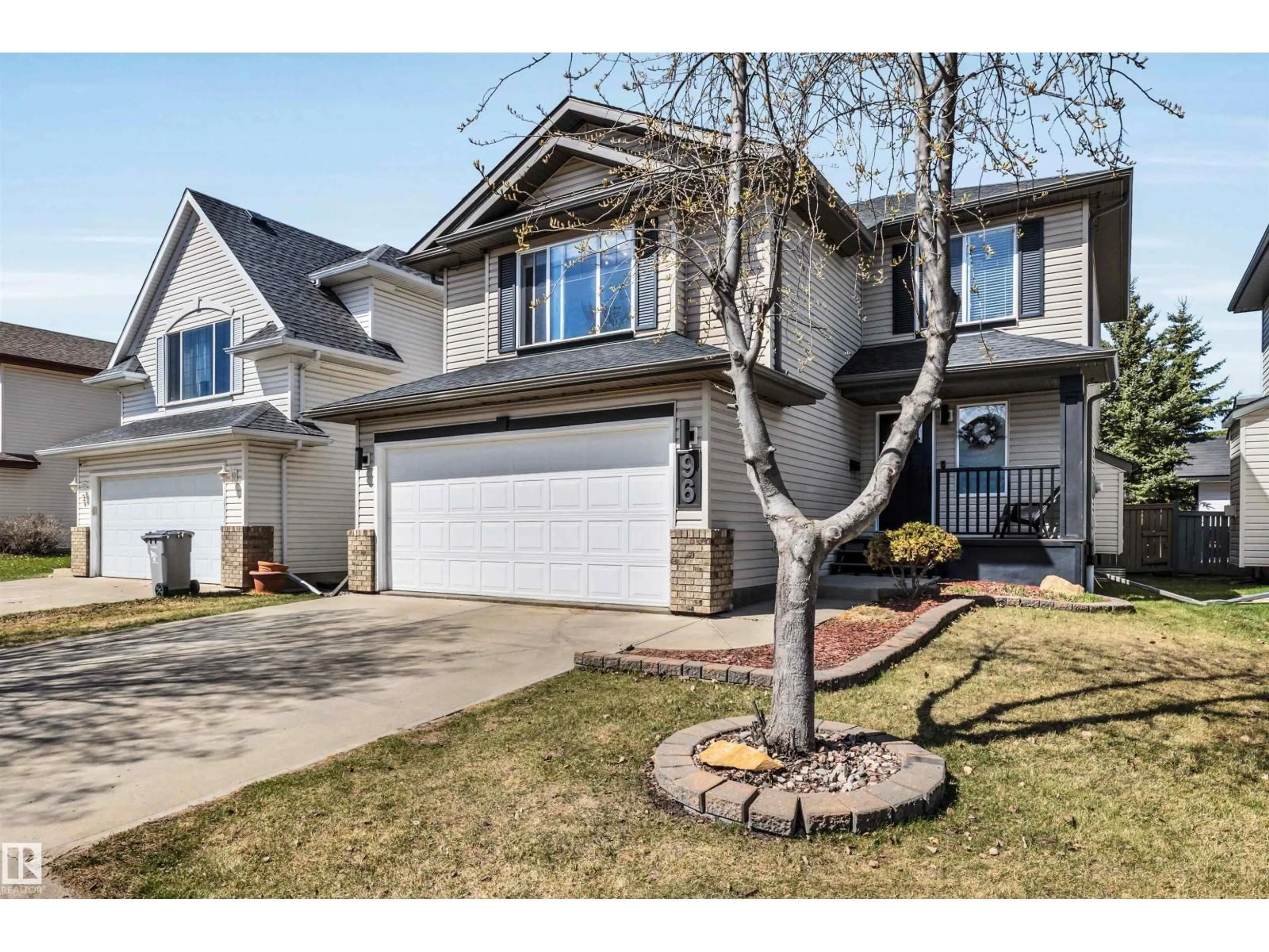 Home with vinyl exterior material, street for 96 BONIN CR, Beaumont Alberta T4X1N7