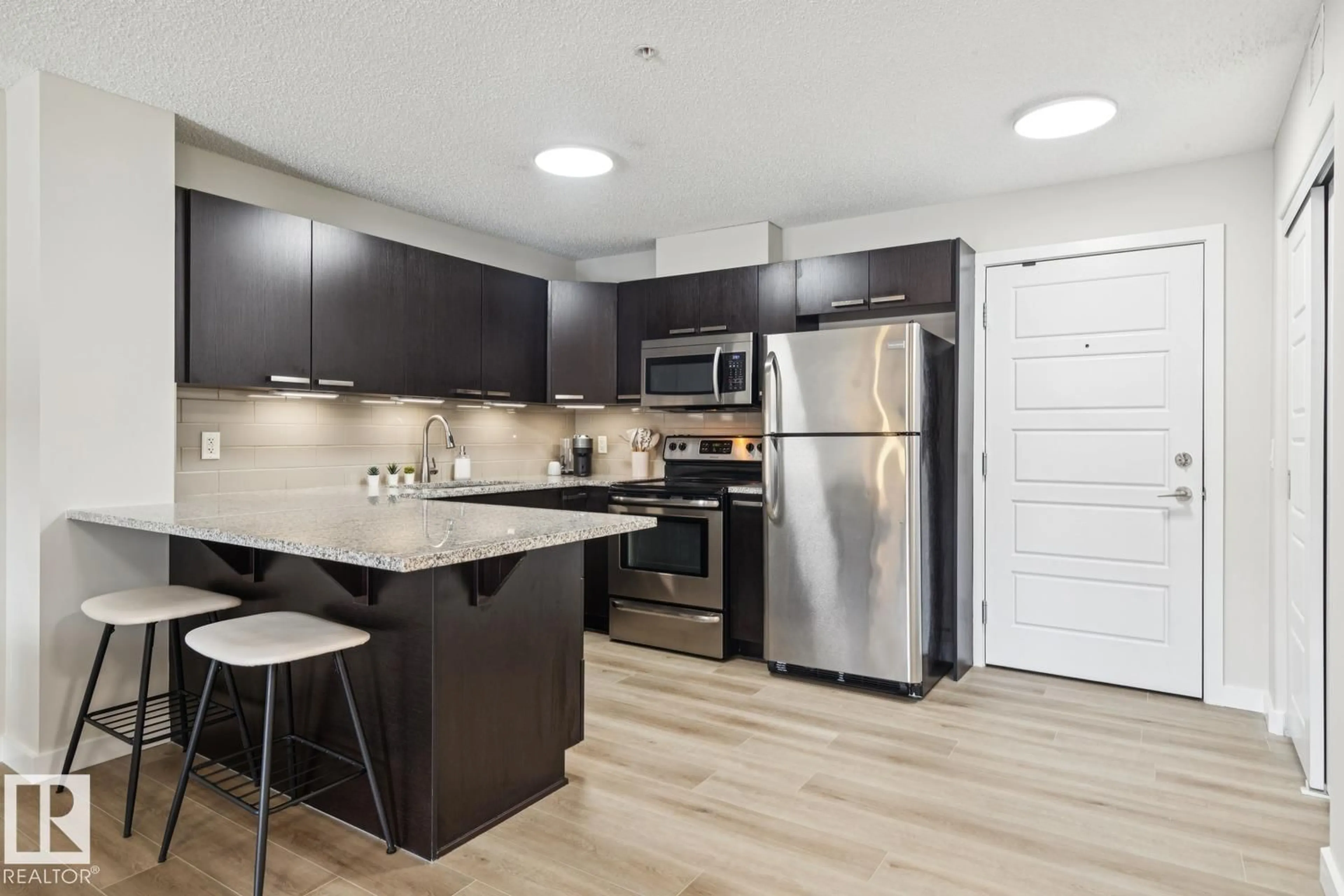 Open concept kitchen, unknown for 206 14808 125 ST NW, Edmonton Alberta T5X0G1