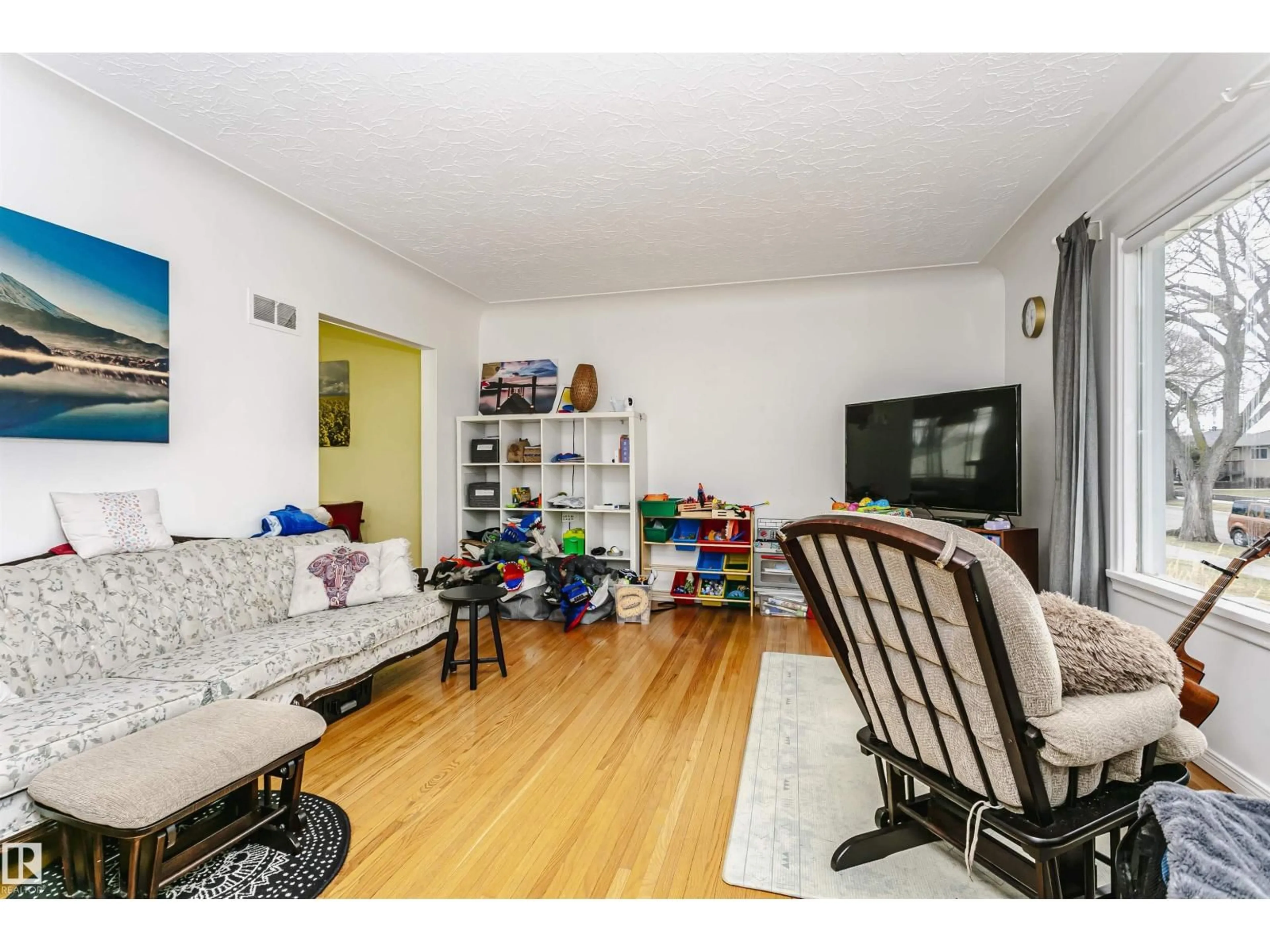 Living room with furniture, unknown for 9760 64 AV, Edmonton Alberta T6E0J5