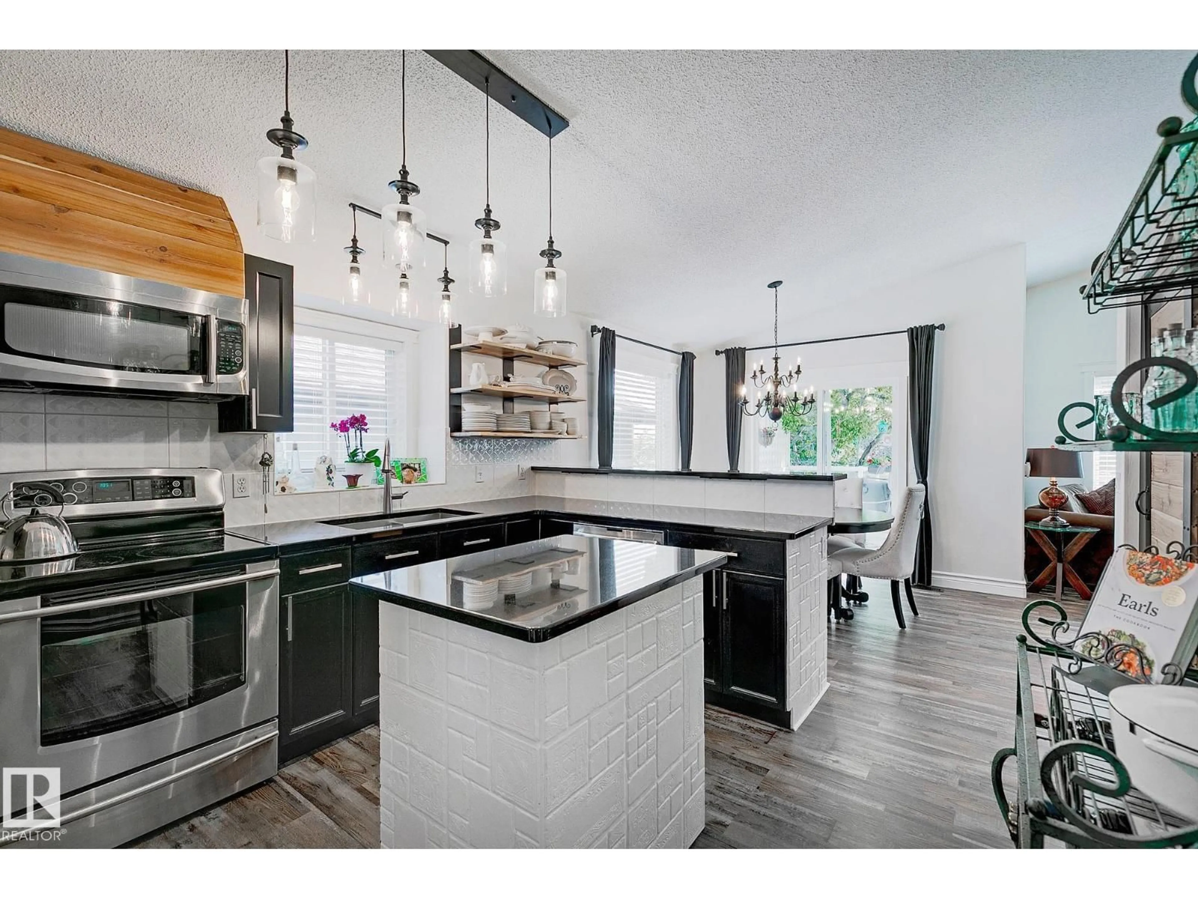 Open concept kitchen, ceramic/tile floor for NW - 15003 128 ST, Edmonton Alberta T6V1E9