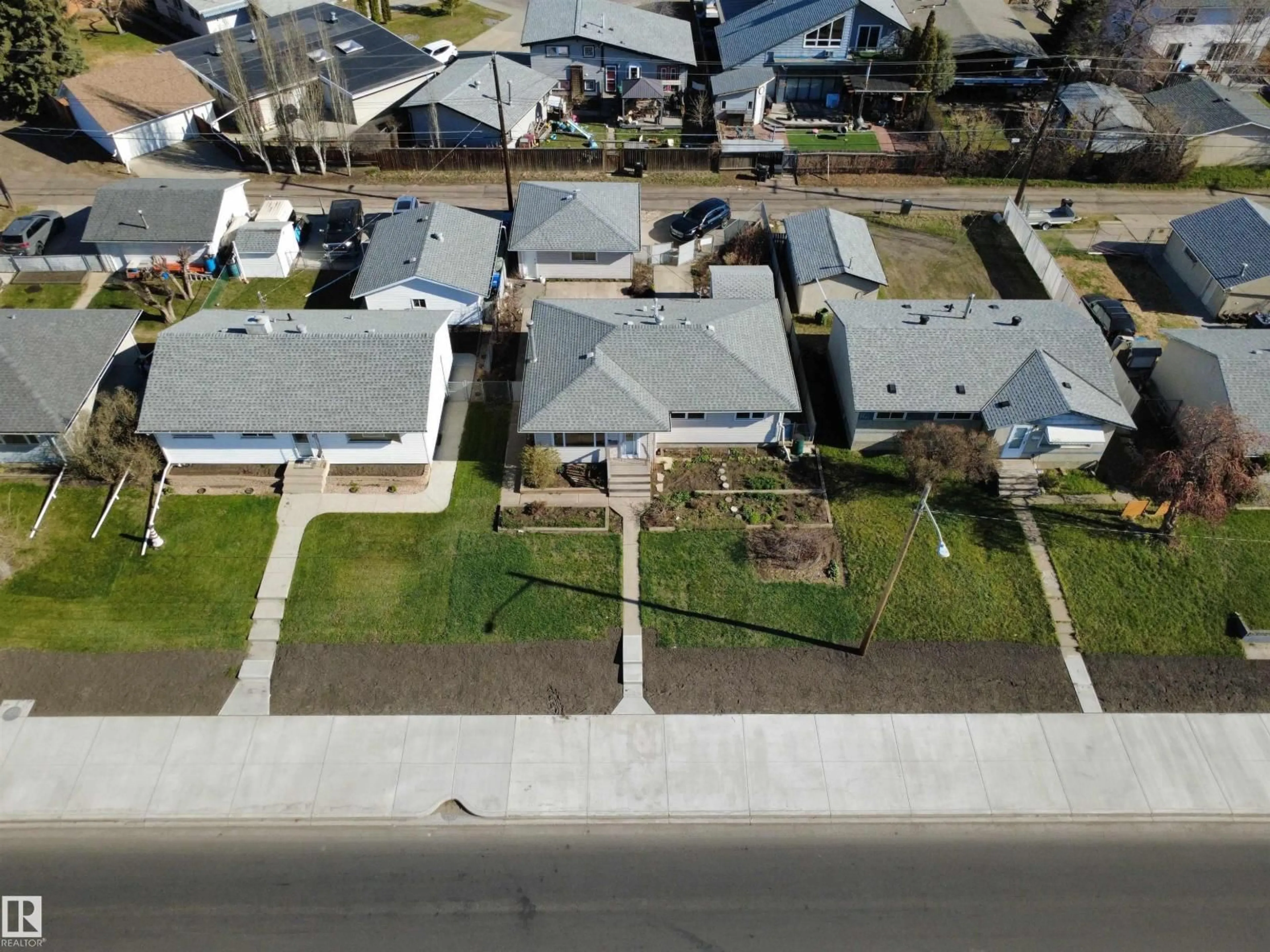 A pic from outside/outdoor area/front of a property/back of a property/a pic from drone, street for 16112 87 AV, Edmonton Alberta T5R4G9