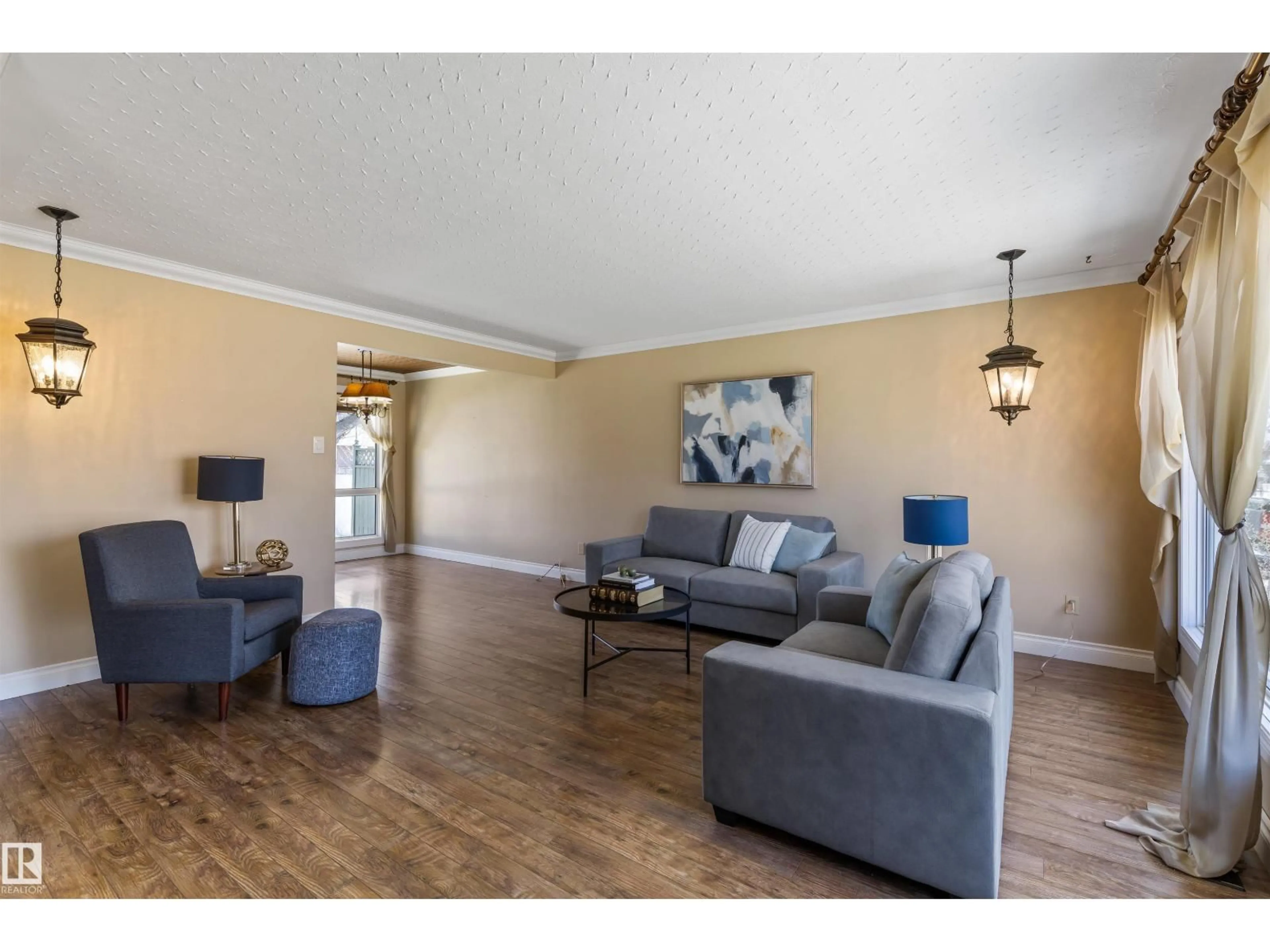 Living room with furniture, wood/laminate floor for 5 GREENVIEW CR, St. Albert Alberta T8N0S9