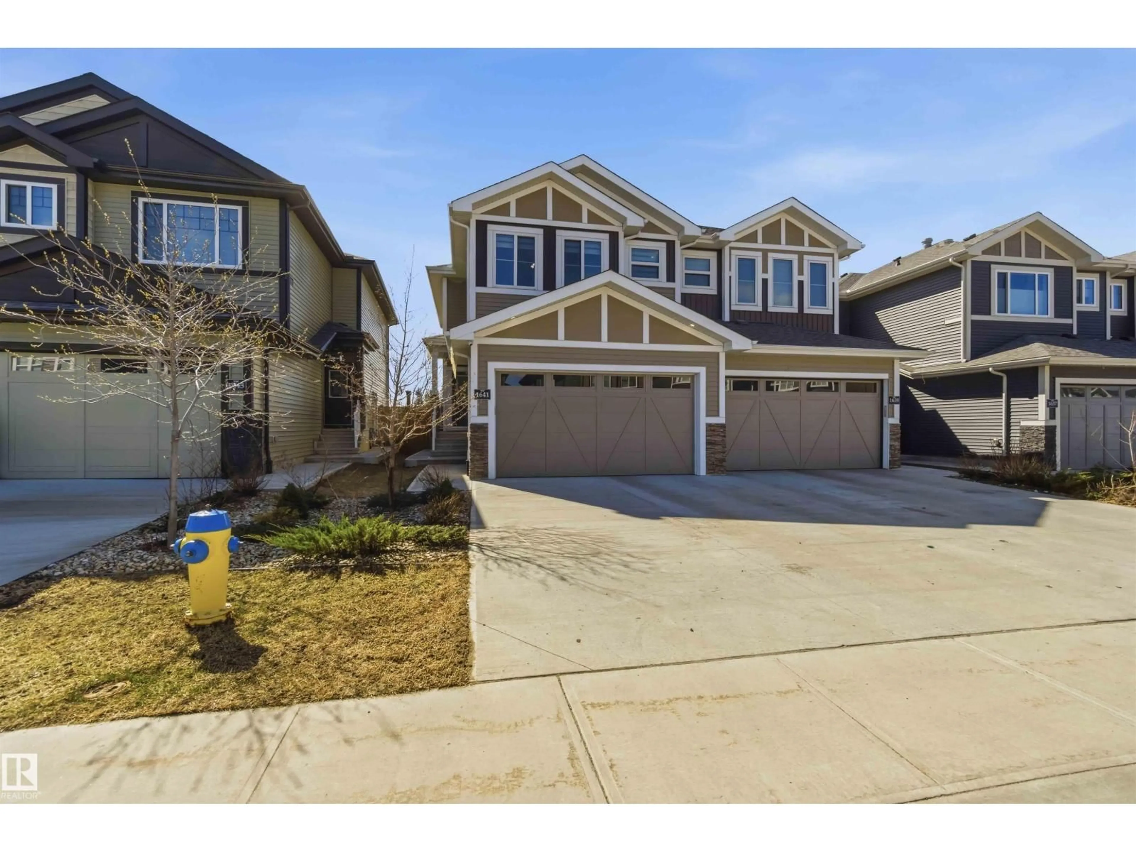 Home with vinyl exterior material, street for 1641 ENRIGHT WY, Edmonton Alberta T6M0Z3
