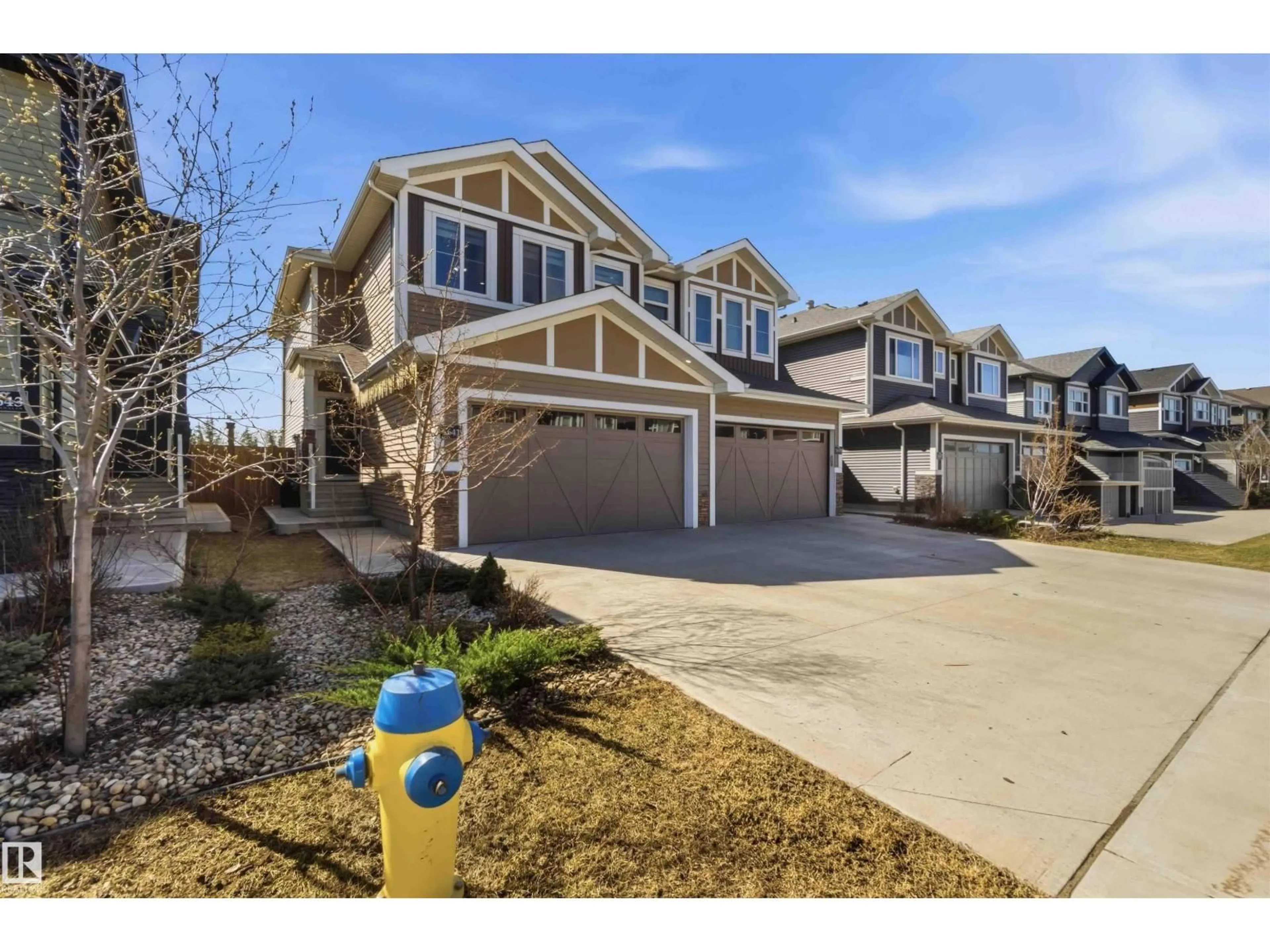 Home with vinyl exterior material, street for 1641 ENRIGHT WY, Edmonton Alberta T6M0Z3