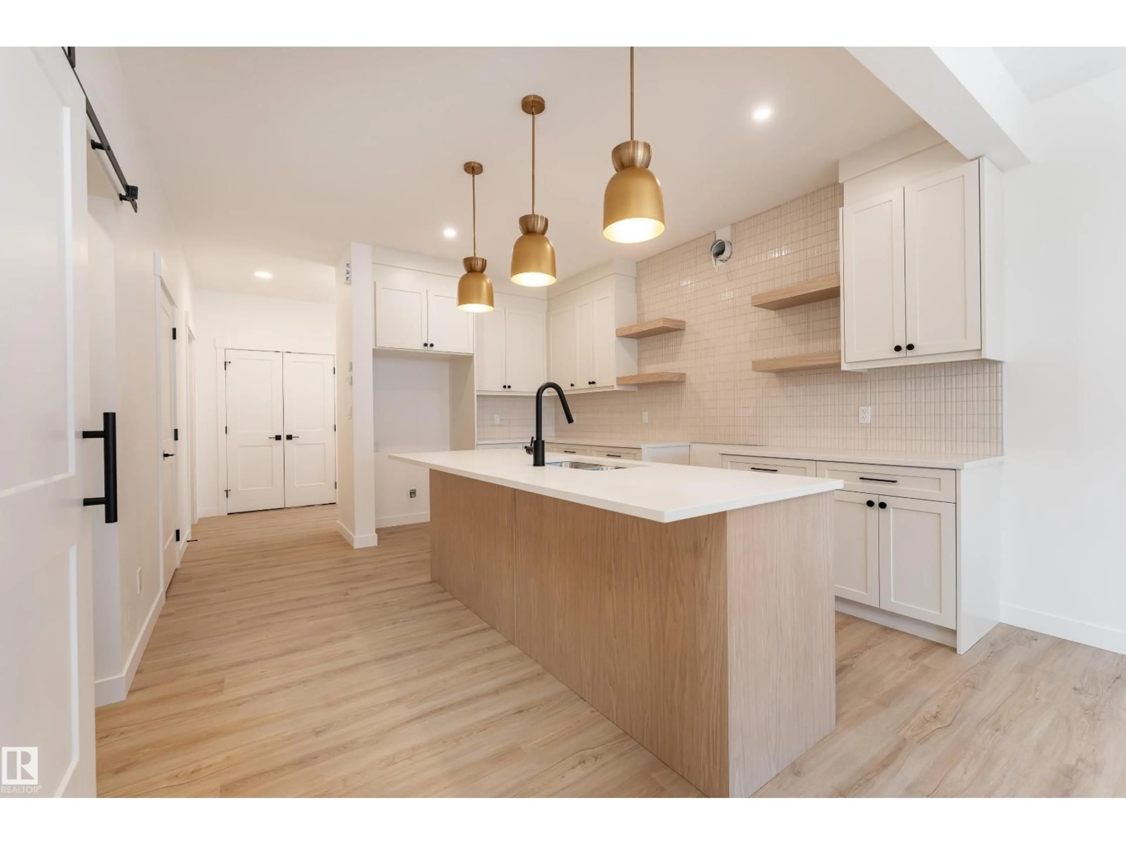 Open concept kitchen, wood/laminate floor for 12 GABLE CM, Spruce Grove Alberta T7X2W2