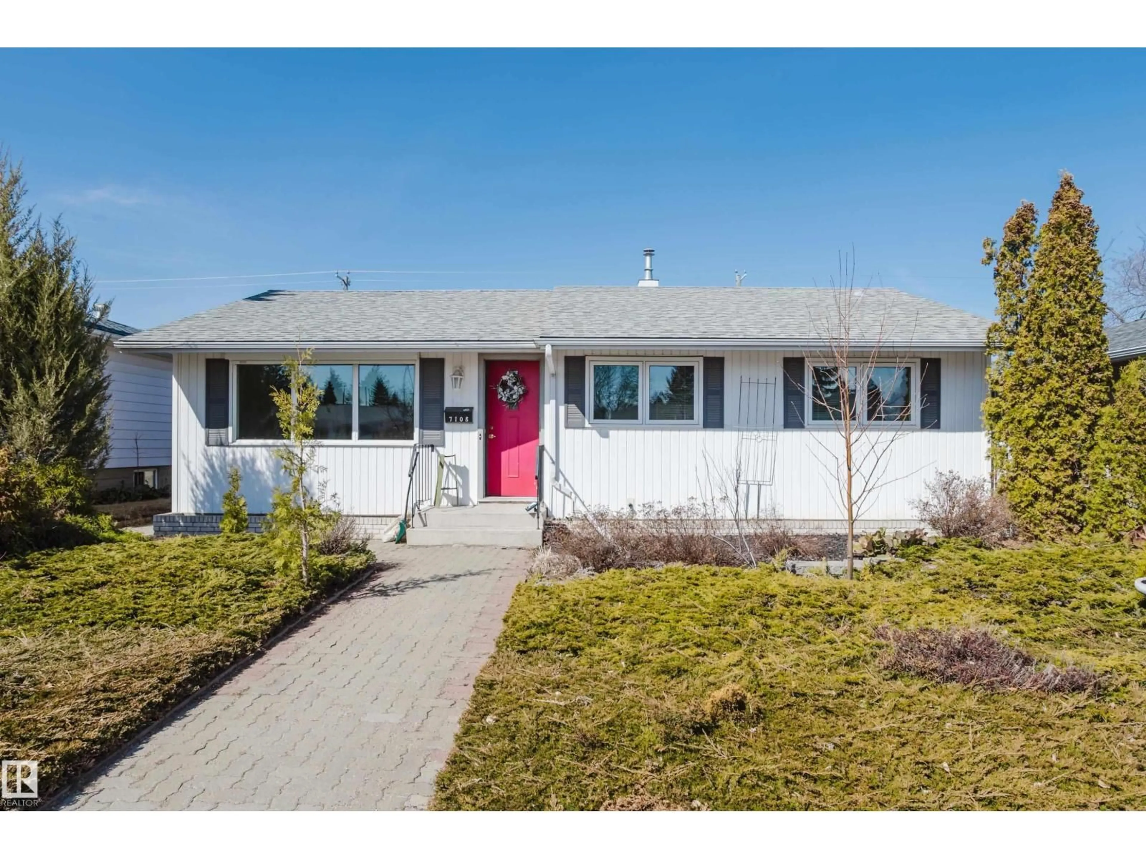 Home with vinyl exterior material, street for 7108 83 ST, Edmonton Alberta T6C2Y3