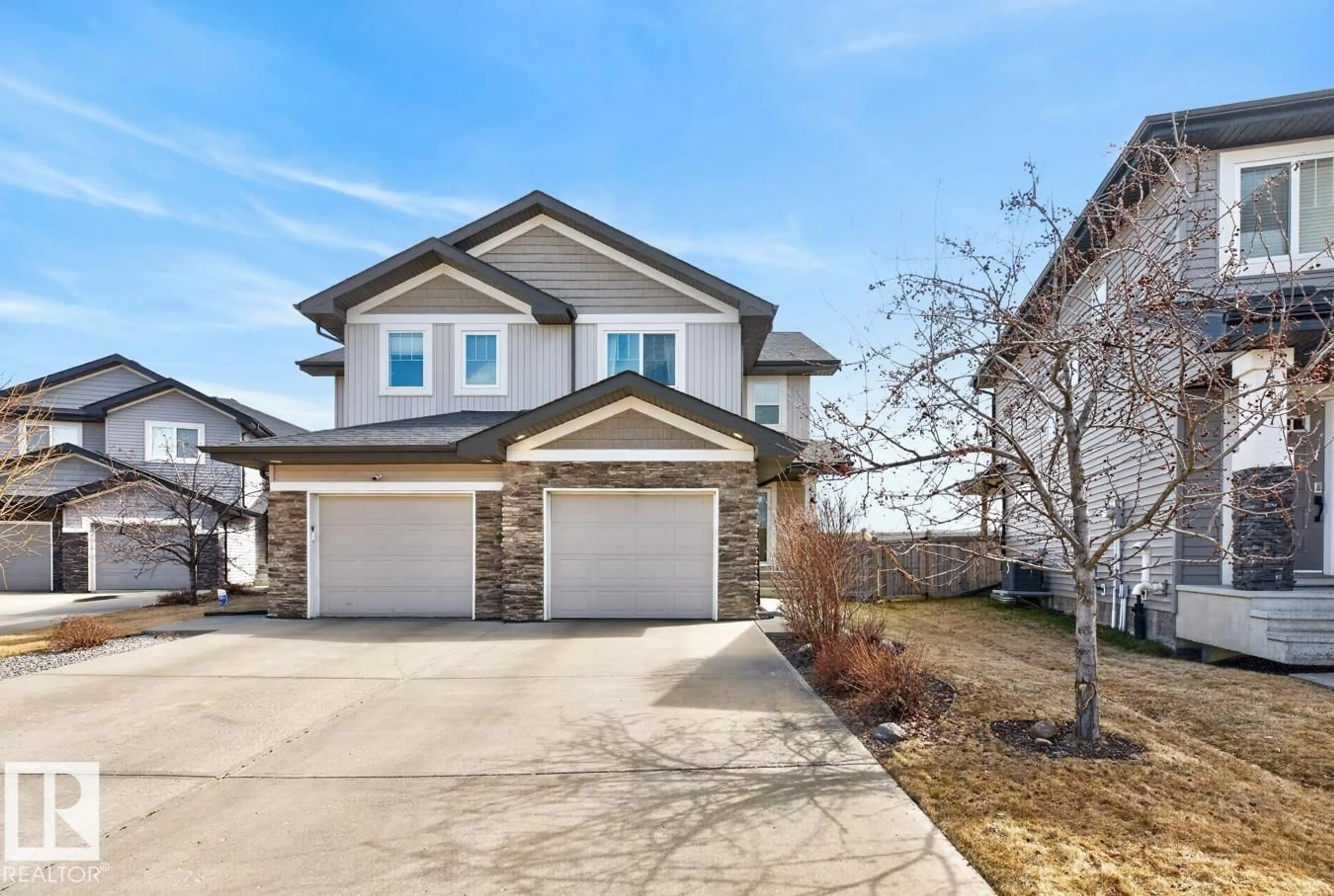 Home with brick exterior material, street for 7135 CARDINAL WY, Edmonton Alberta T6W1Z3