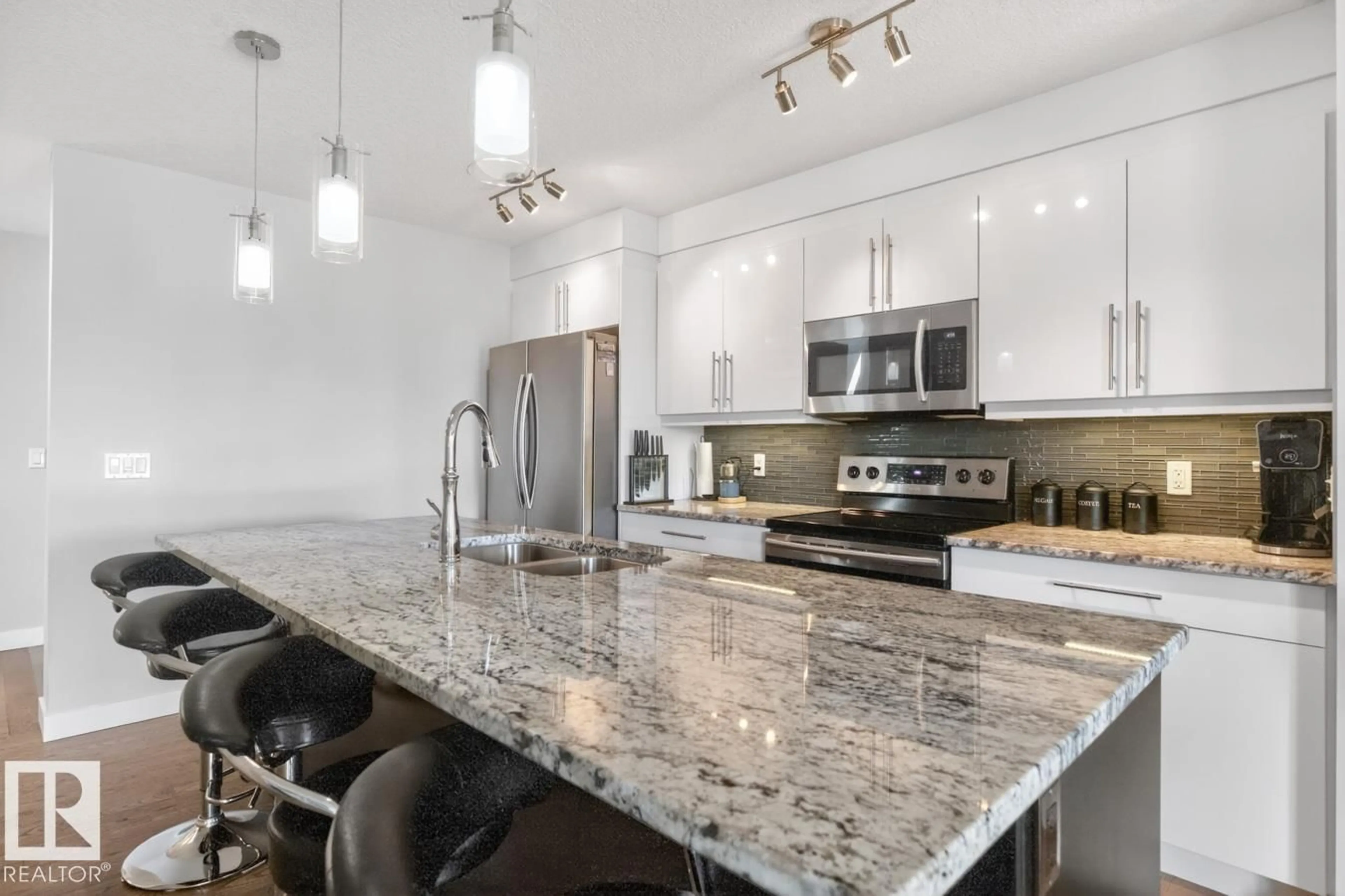 Open concept kitchen, ceramic/tile floor for 7135 CARDINAL WY, Edmonton Alberta T6W1Z3