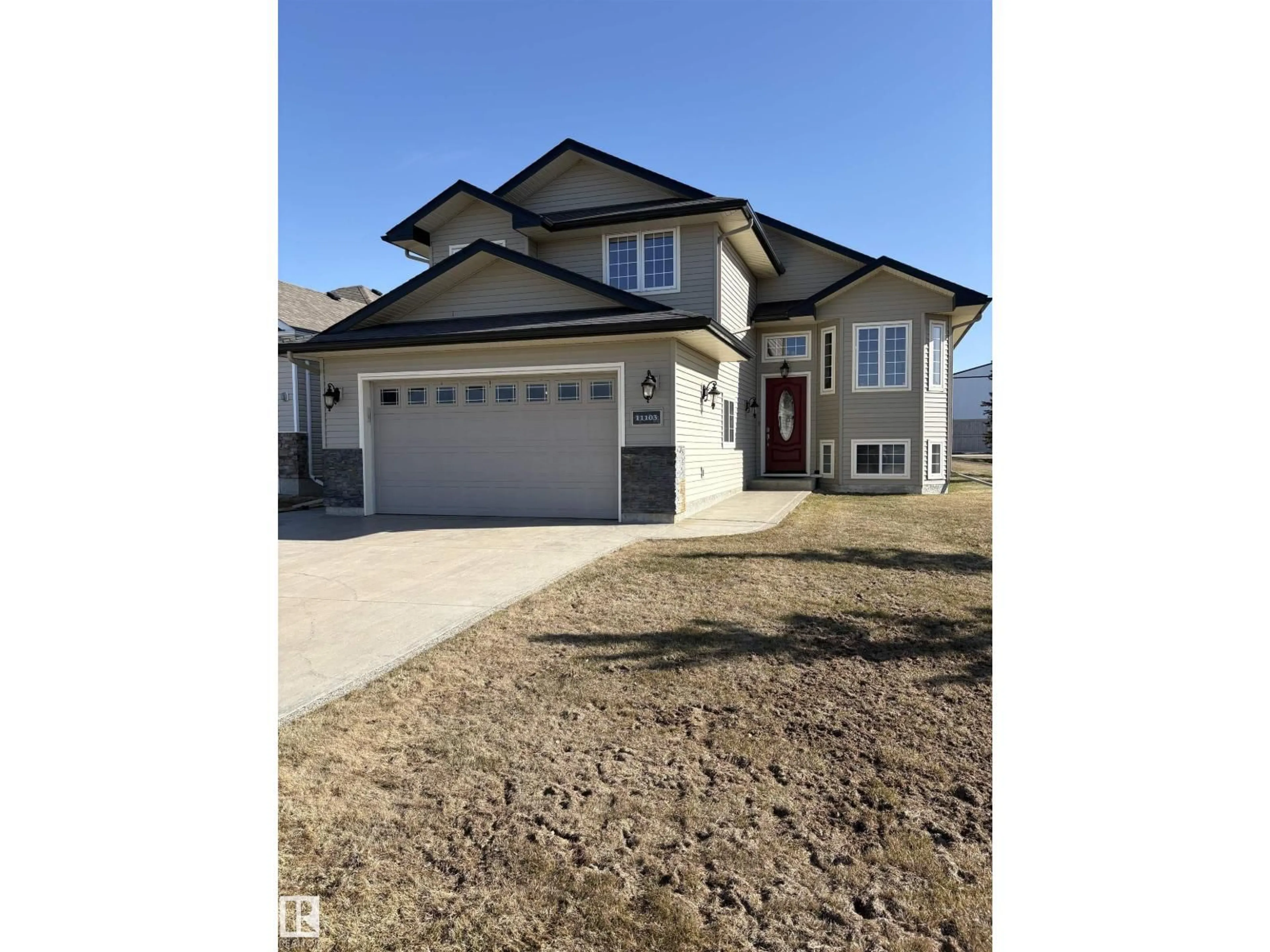 Home with vinyl exterior material, street for 11103 103 ST, Westlock Alberta T7P1G6