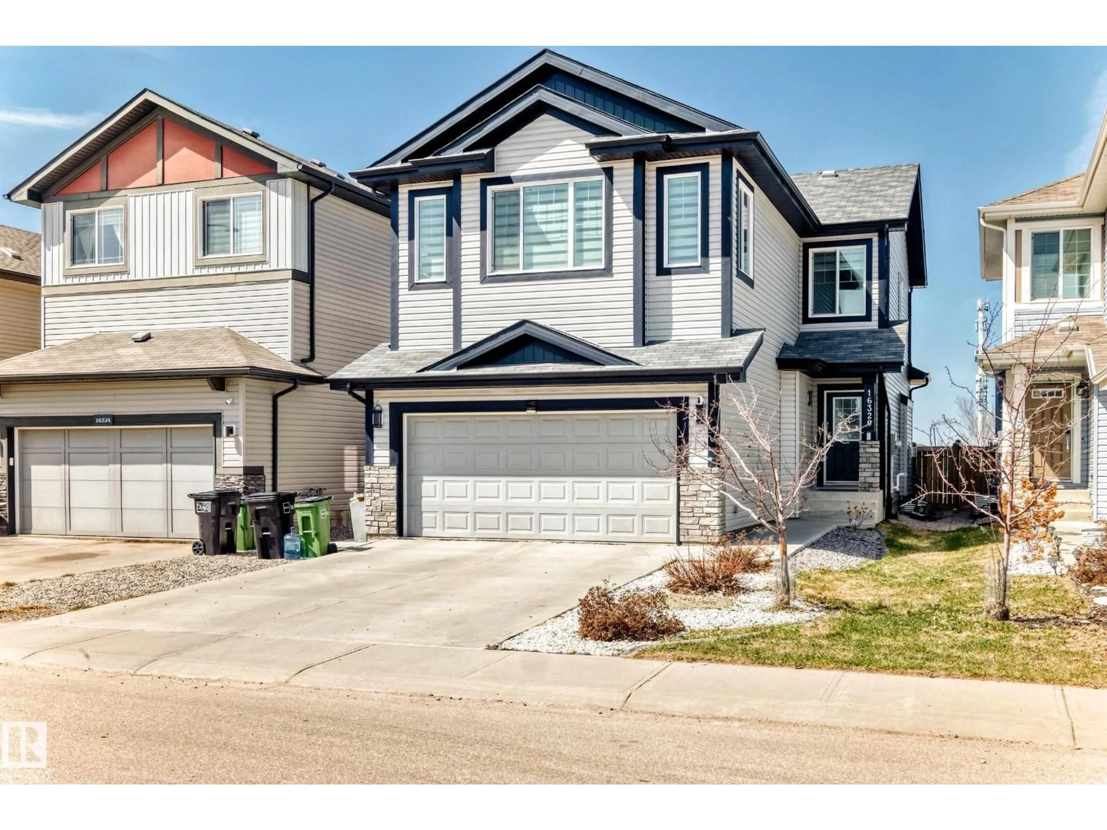 Home with vinyl exterior material, street for SW - 16320 12 AV, Edmonton Alberta T6W3K4