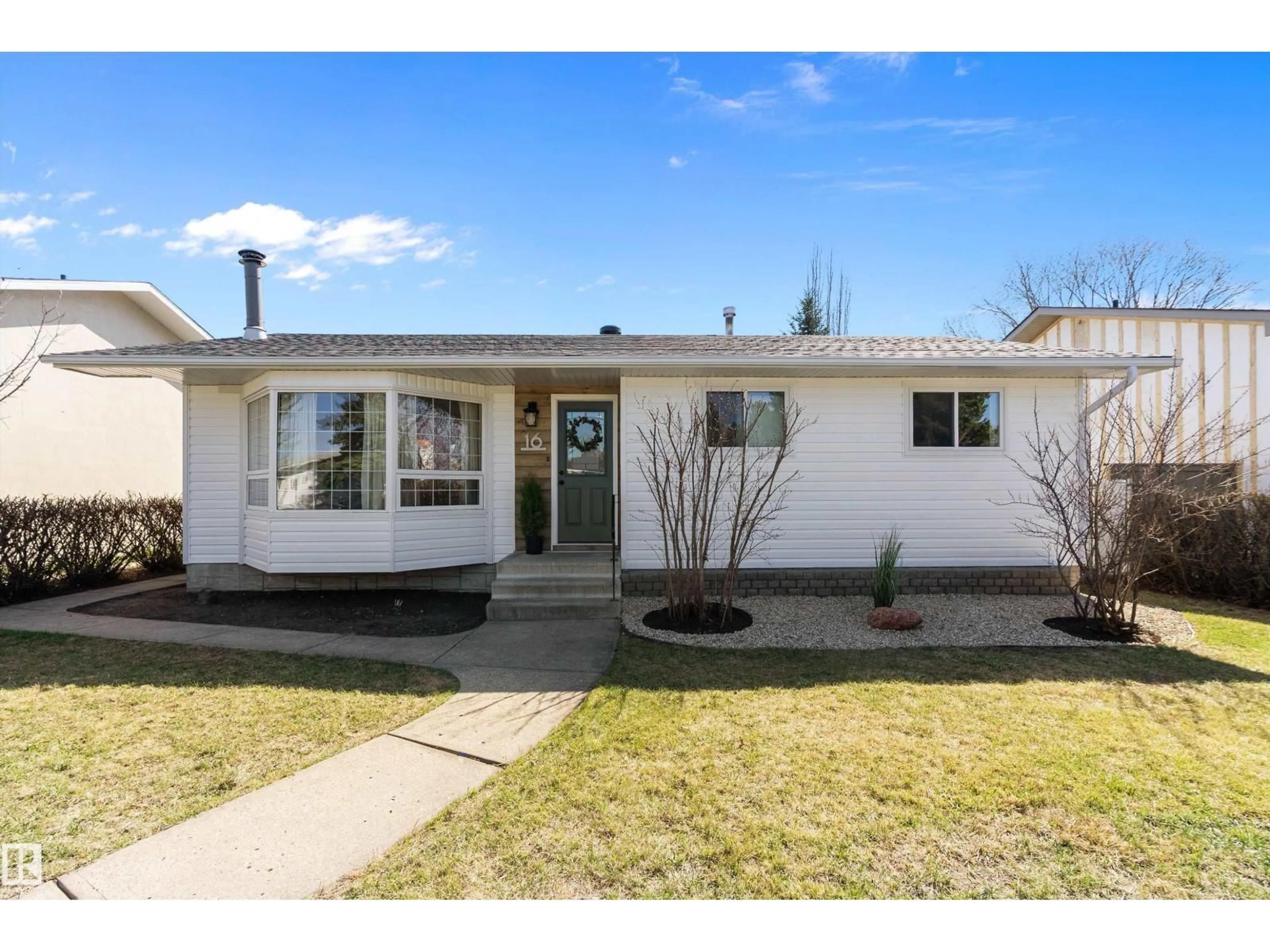 Home with vinyl exterior material, street for 16 CAMELOT AV, Leduc Alberta T9E4M3