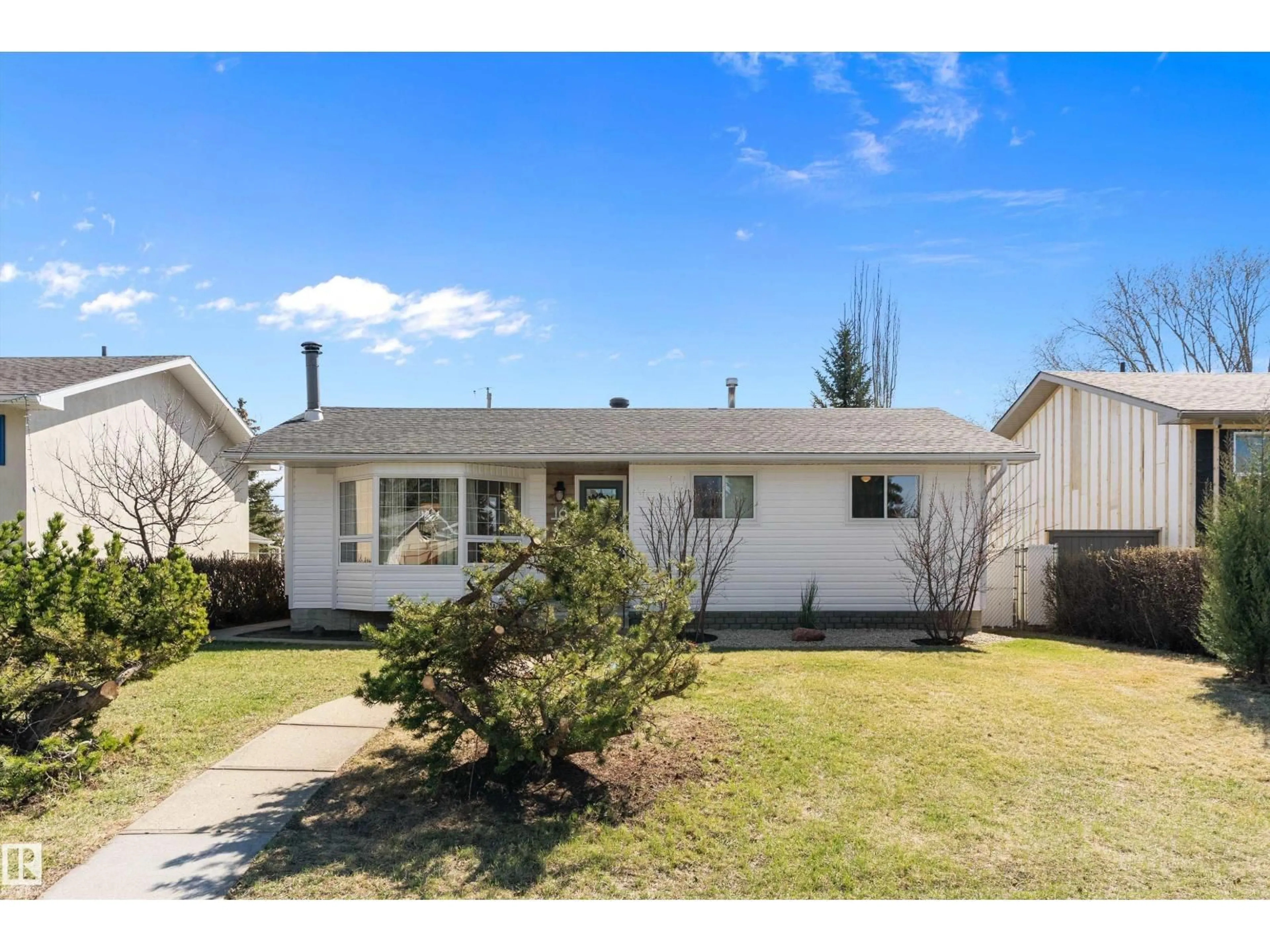 Home with vinyl exterior material, street for 16 CAMELOT AV, Leduc Alberta T9E4M3