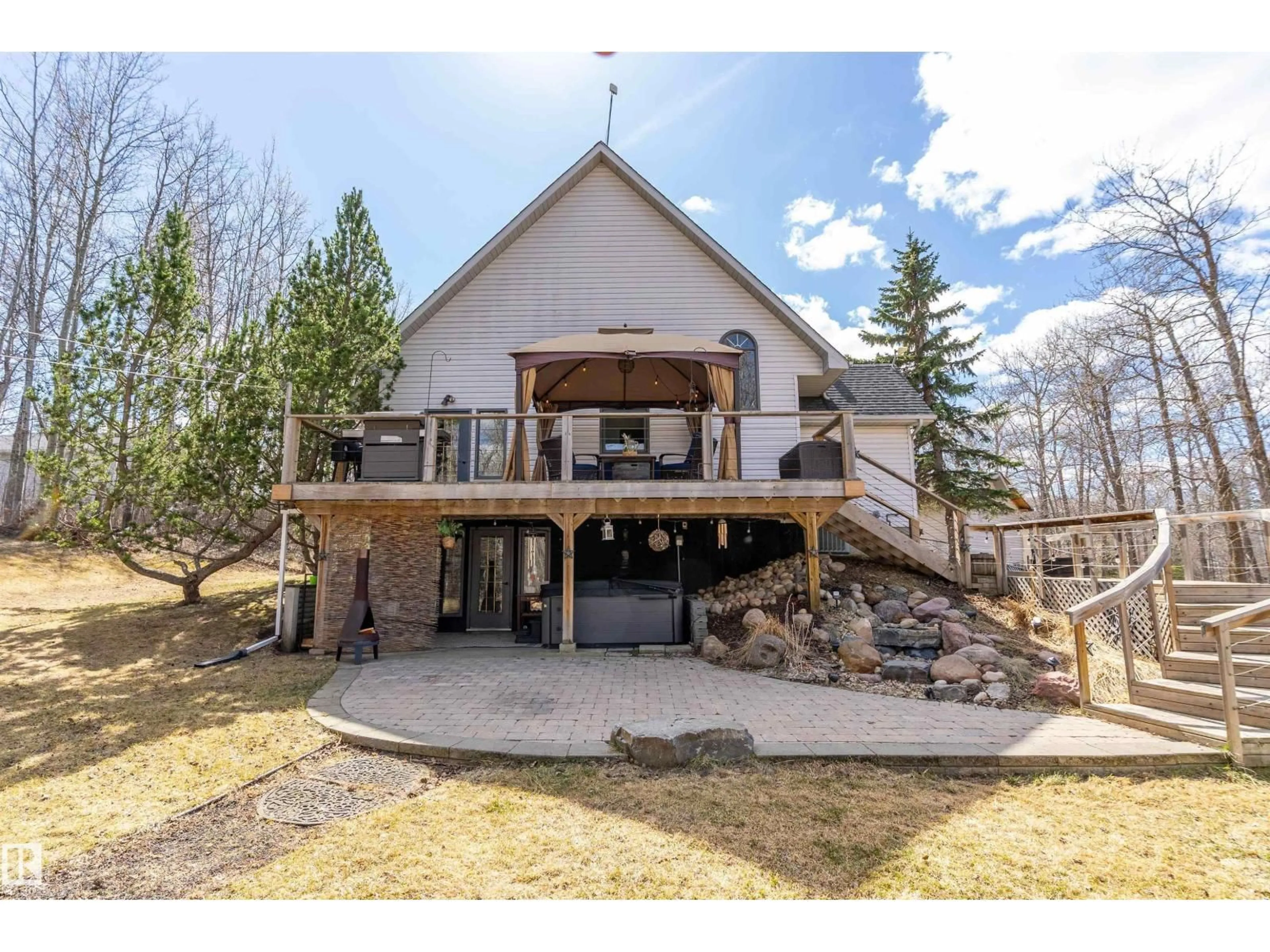 A pic from outside/outdoor area/front of a property/back of a property/a pic from drone, water/lake/river/ocean view for #7 - 52437 RGE ROAD 21, Rural Parkland County Alberta T7Y2H1