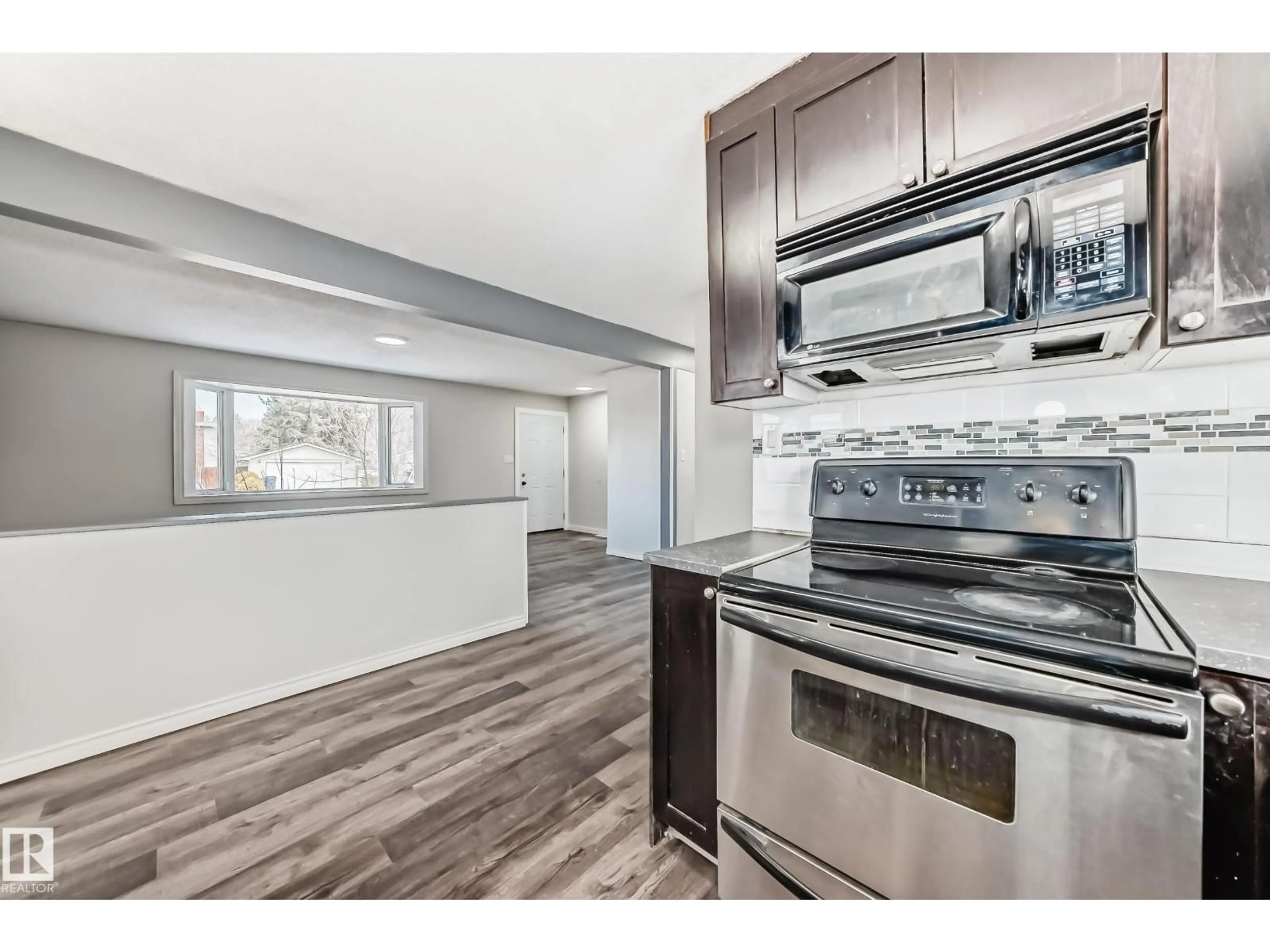 Open concept kitchen, unknown for 8615 42A AV, Edmonton Alberta T6K1E6