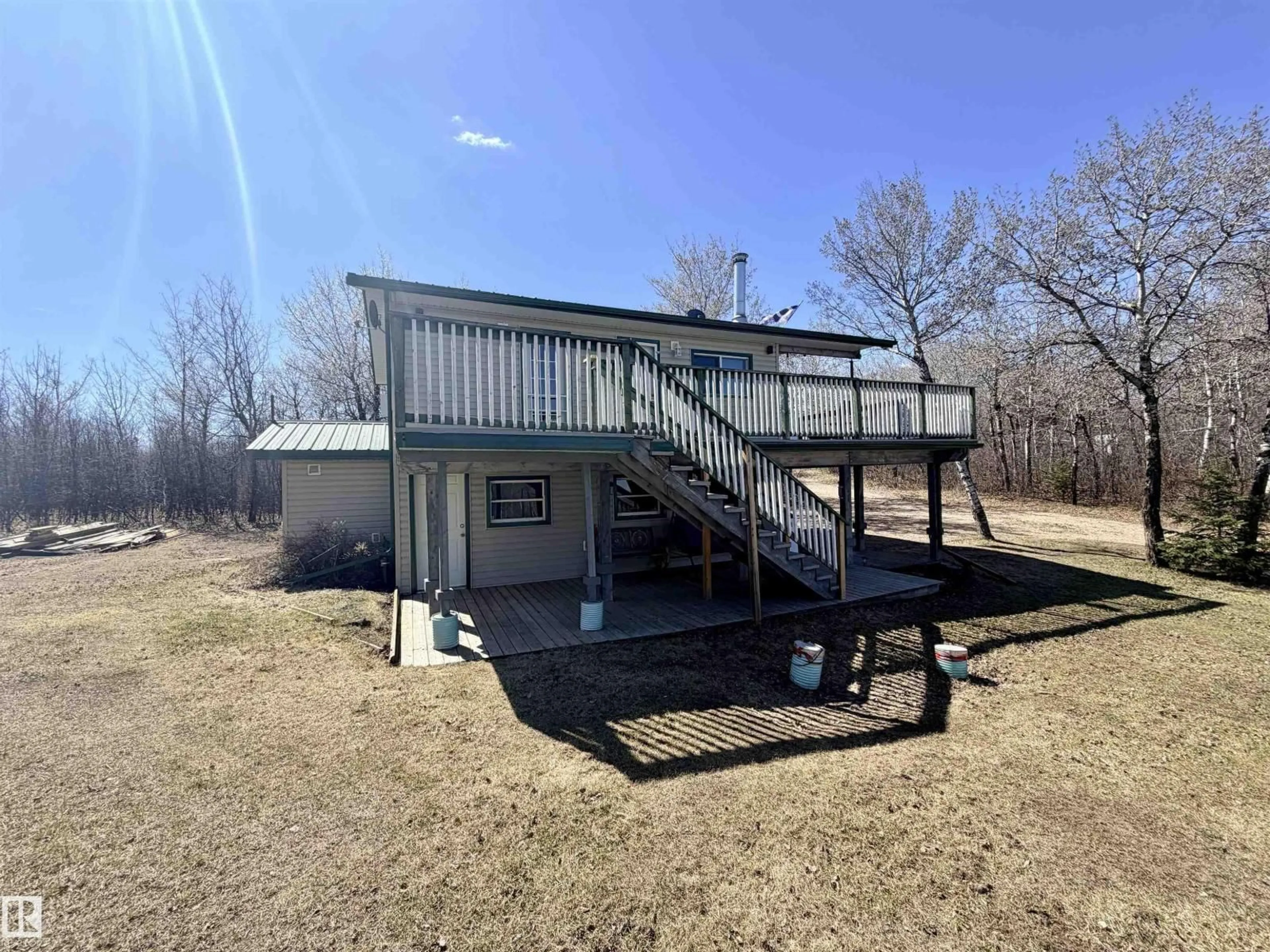 A pic from outside/outdoor area/front of a property/back of a property/a pic from drone, building for 562007 - 61 RR 113 RR, Rural Two Hills County Alberta T0B4K0