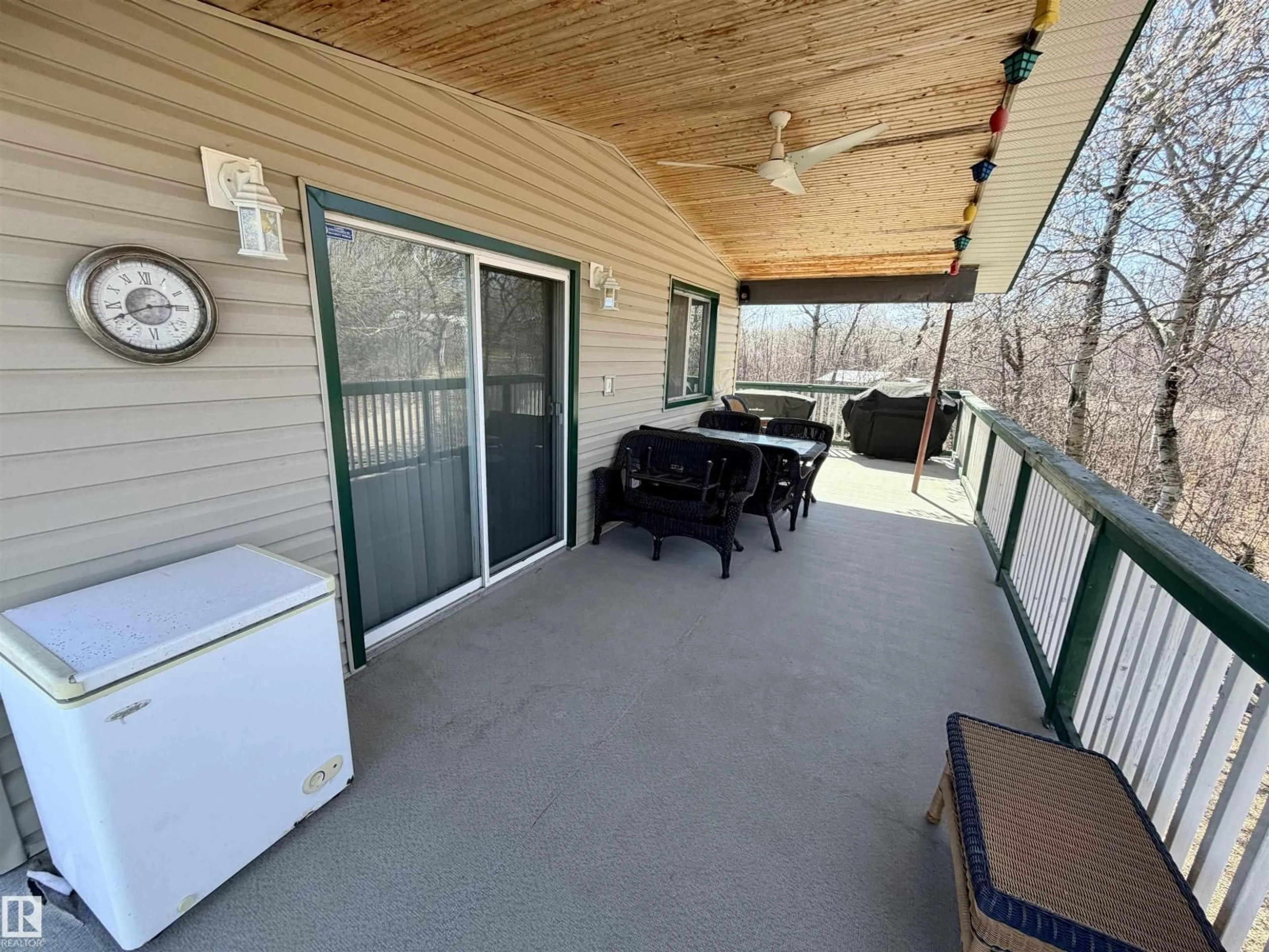 Patio, water/lake/river/ocean view for 562007 - 61 RR 113 RR, Rural Two Hills County Alberta T0B4K0