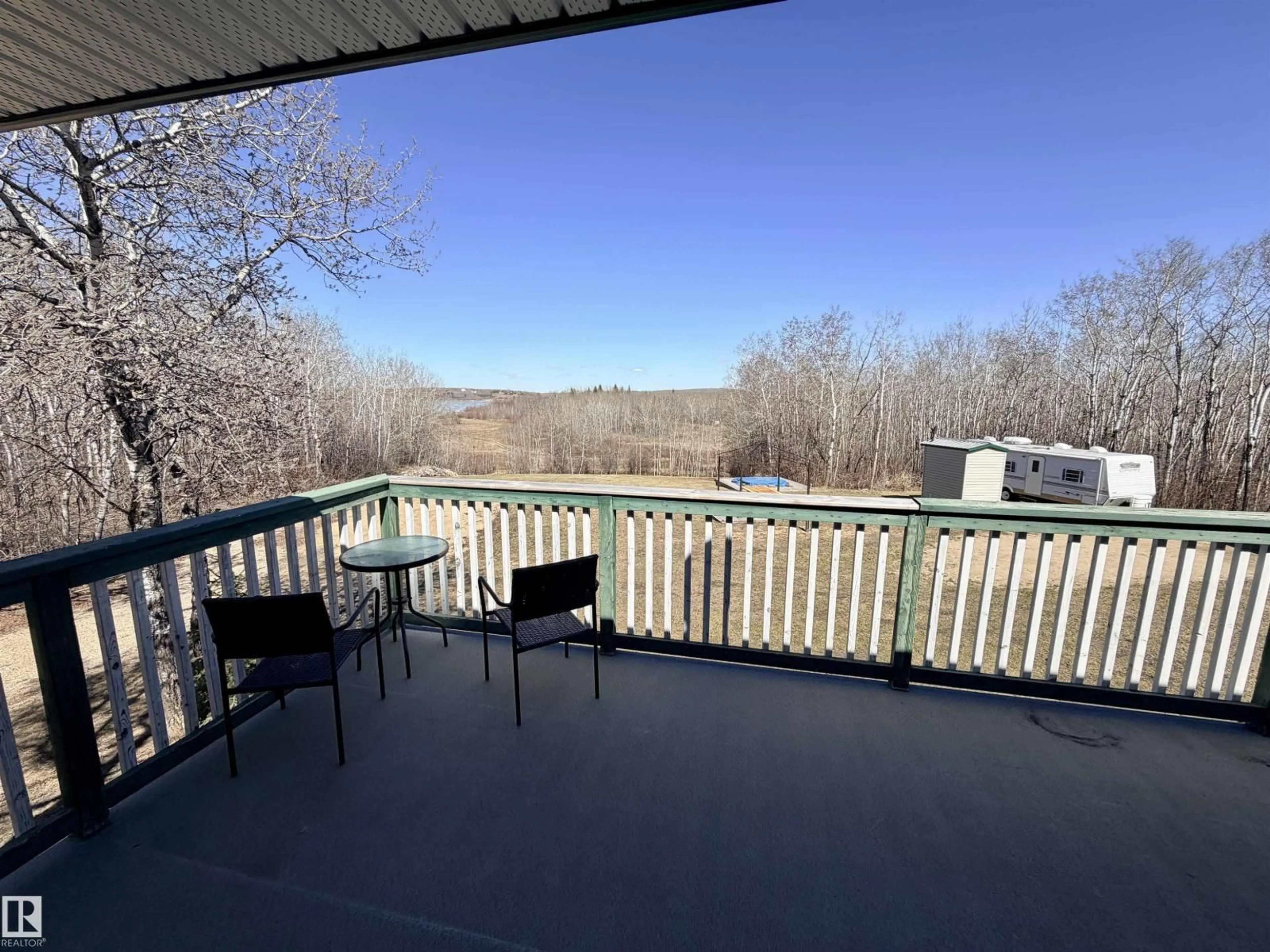 Patio, water/lake/river/ocean view for 562007 - 61 RR 113 RR, Rural Two Hills County Alberta T0B4K0