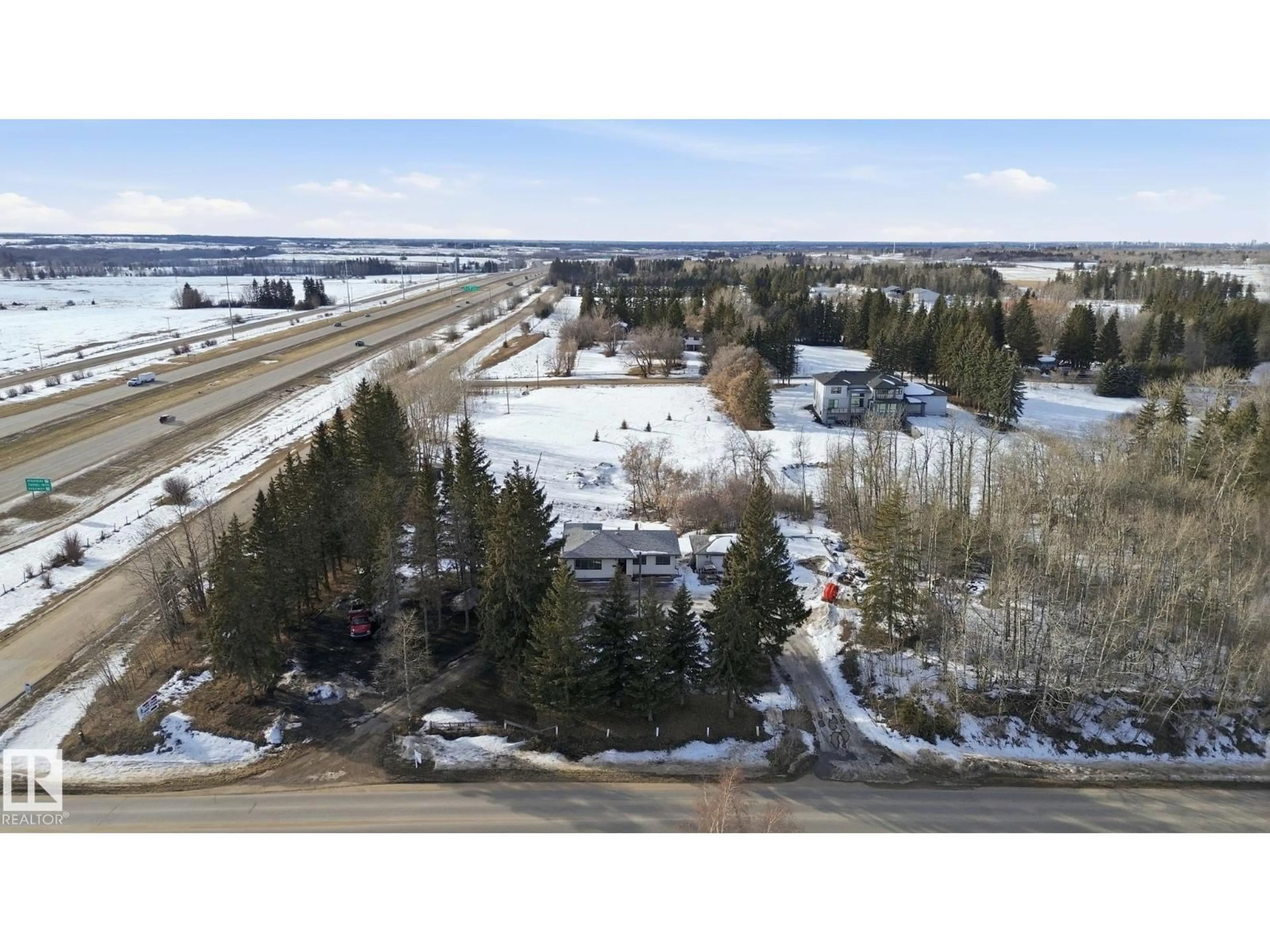 A pic from outside/outdoor area/front of a property/back of a property/a pic from drone, unknown for 51548 RGE ROAD 232 NE, Rural Strathcona County Alberta T8B1B1