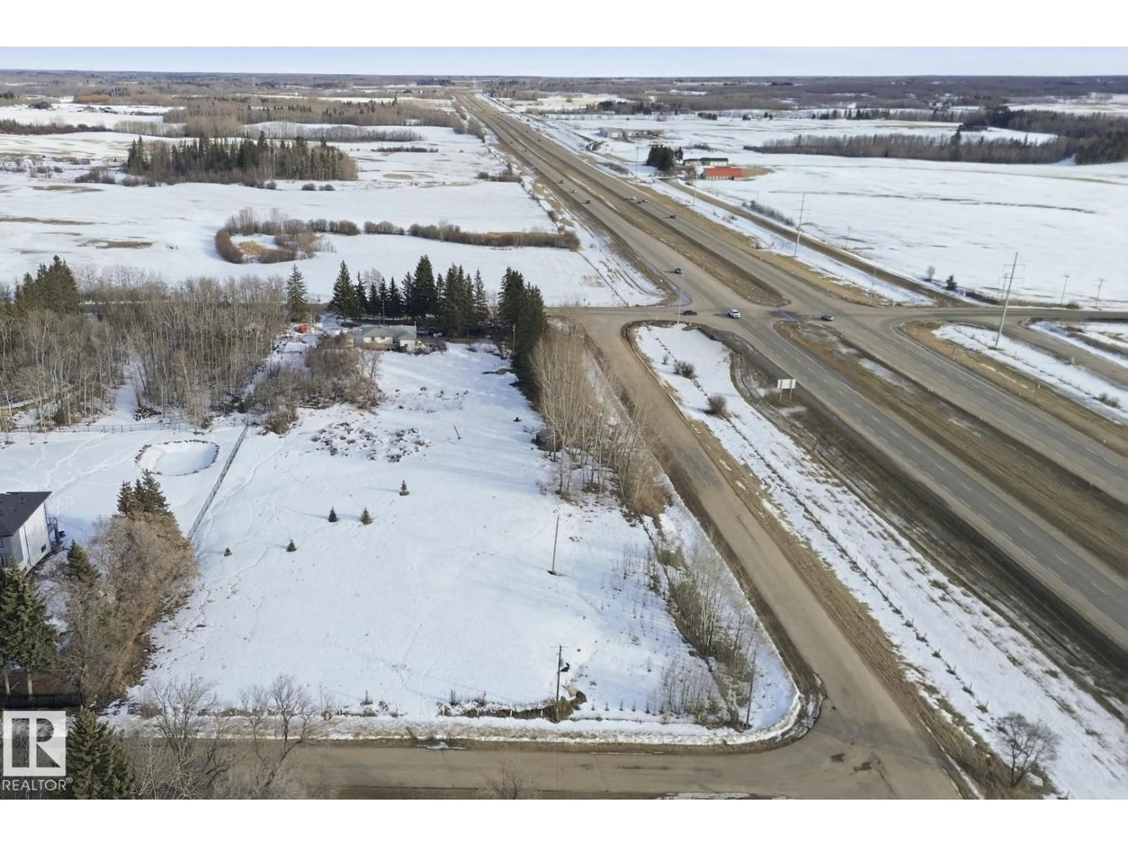 A pic from outside/outdoor area/front of a property/back of a property/a pic from drone, street for 51548 RGE ROAD 232 NE, Rural Strathcona County Alberta T8B1B1