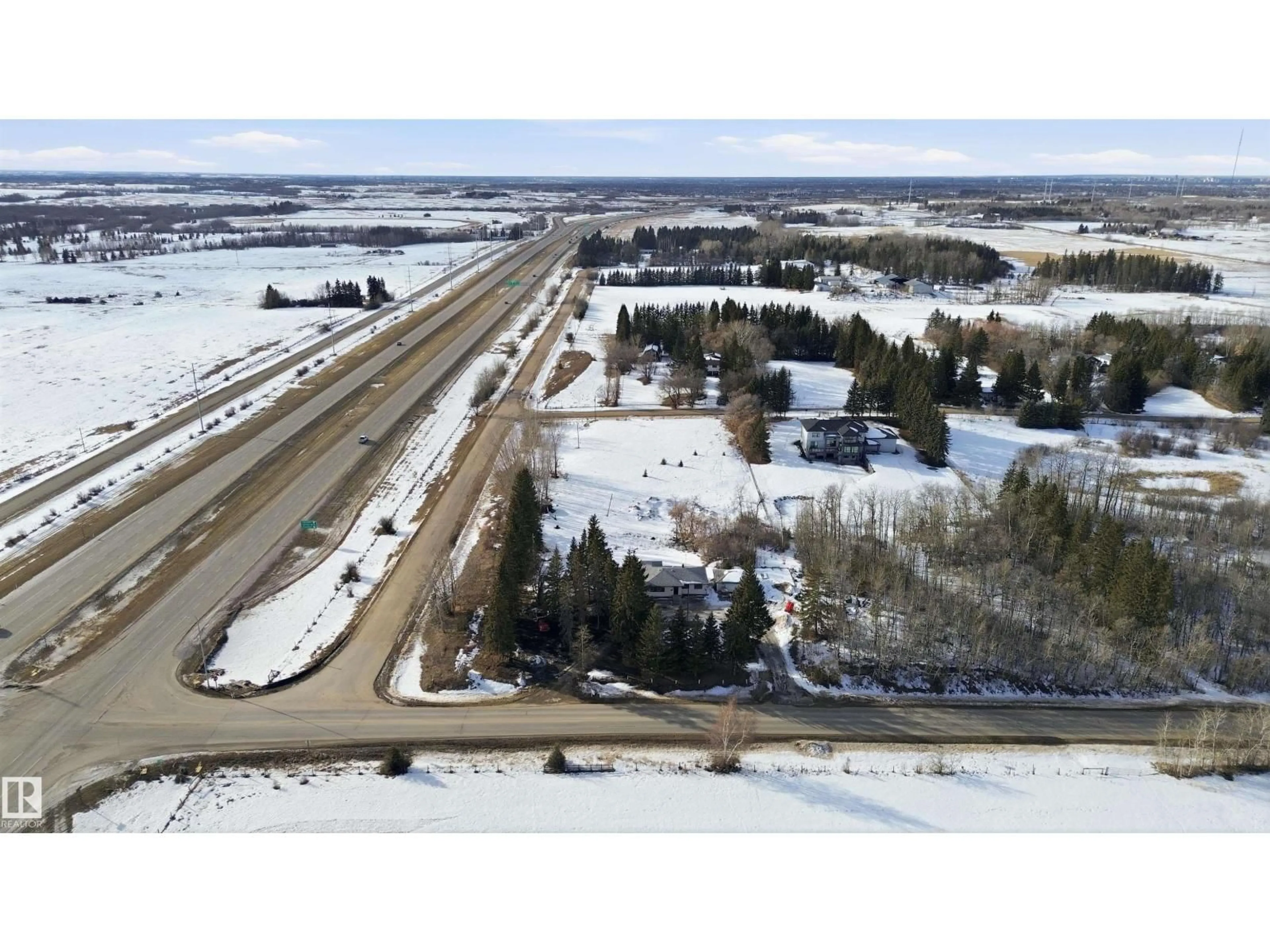 A pic from outside/outdoor area/front of a property/back of a property/a pic from drone, street for 51548 RGE ROAD 232 NE, Rural Strathcona County Alberta T8B1B1
