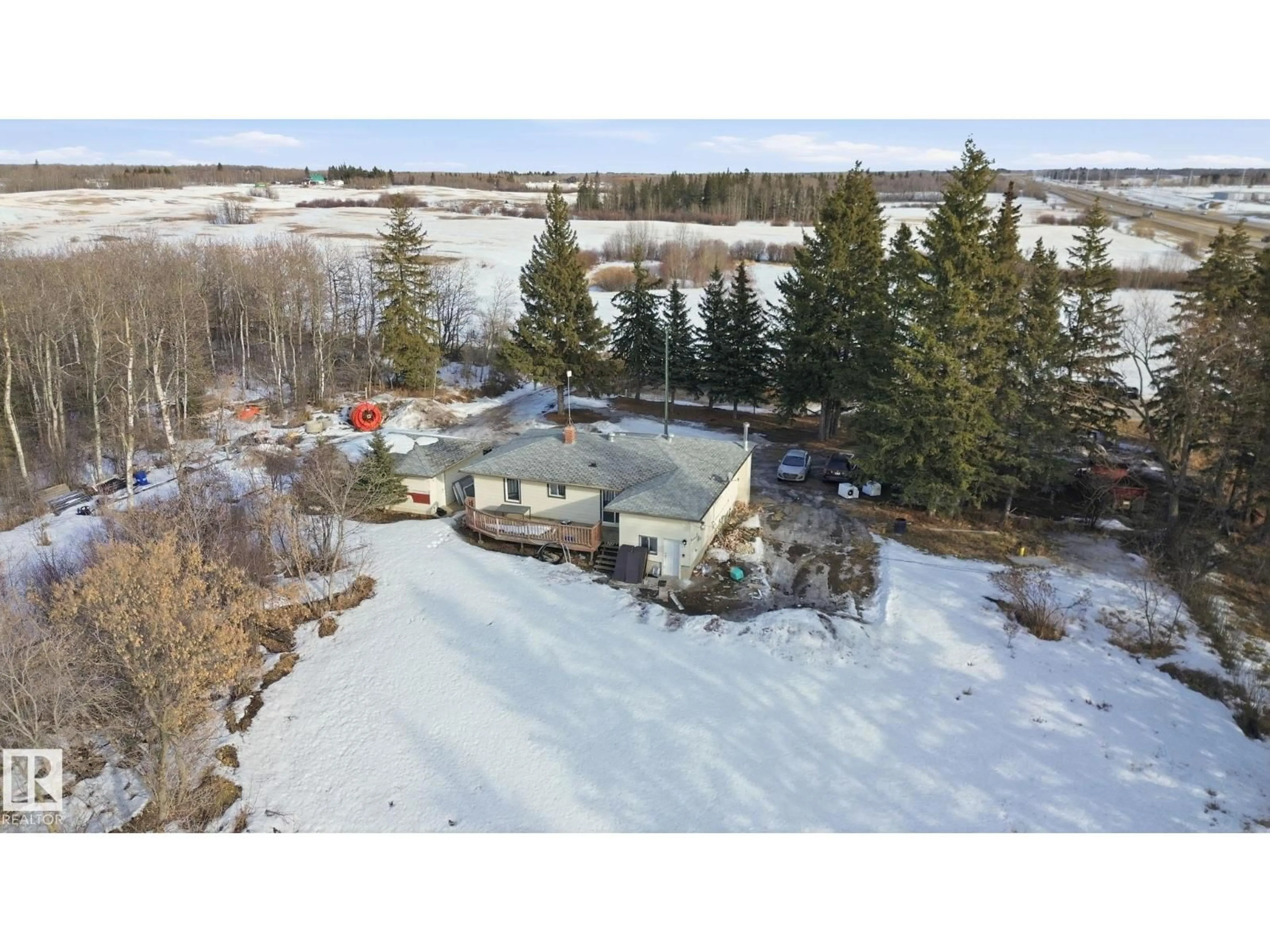 A pic from outside/outdoor area/front of a property/back of a property/a pic from drone, water/lake/river/ocean view for 51548 RGE ROAD 232 NE, Rural Strathcona County Alberta T8B1B1