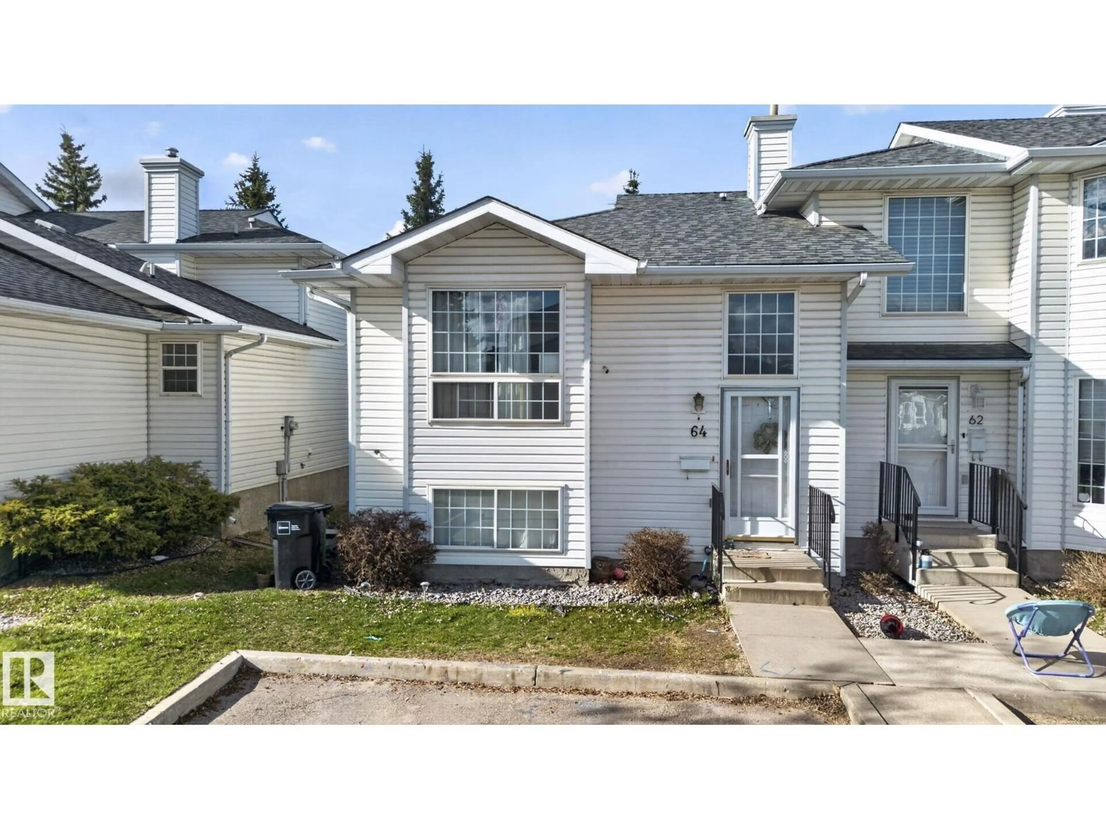 Home with vinyl exterior material, street for 64 3311 58 ST, Edmonton Alberta T6L6X3
