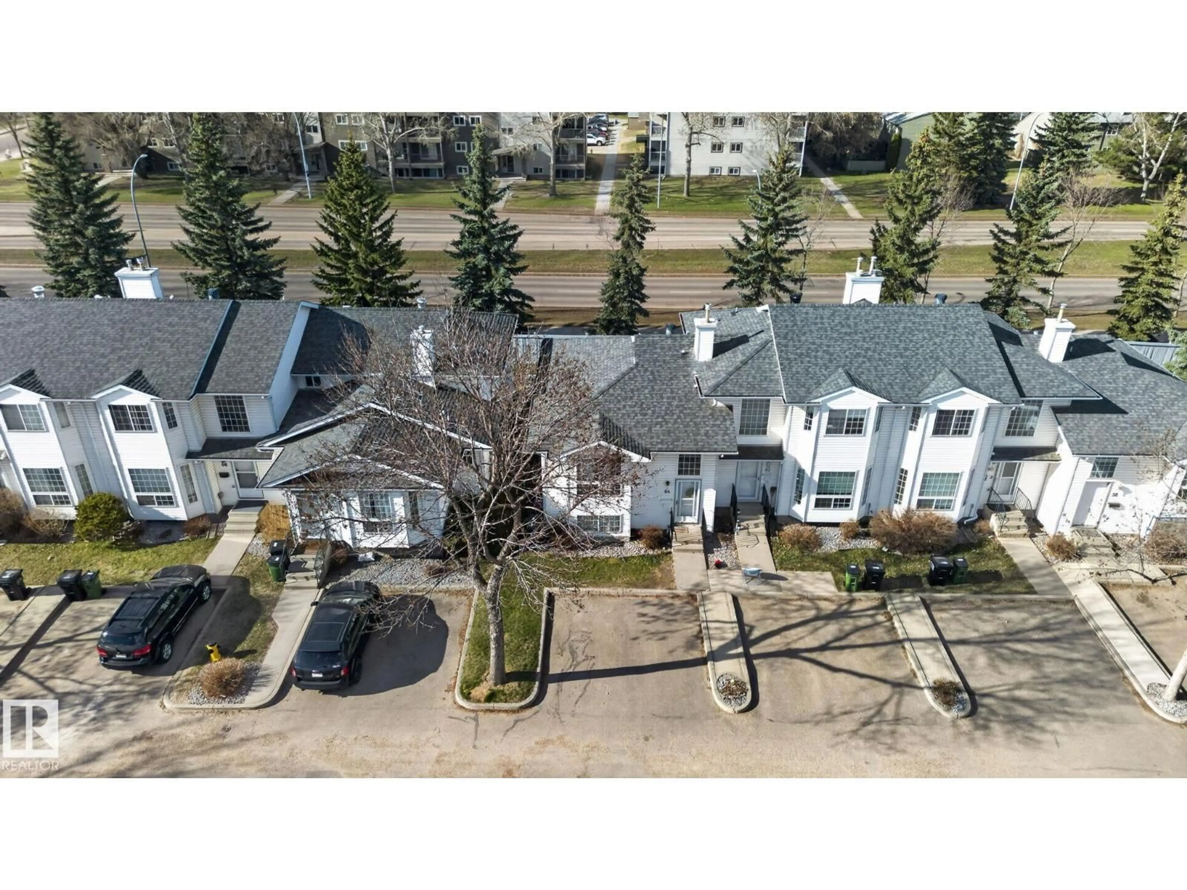 A pic from outside/outdoor area/front of a property/back of a property/a pic from drone, street for 64 3311 58 ST, Edmonton Alberta T6L6X3