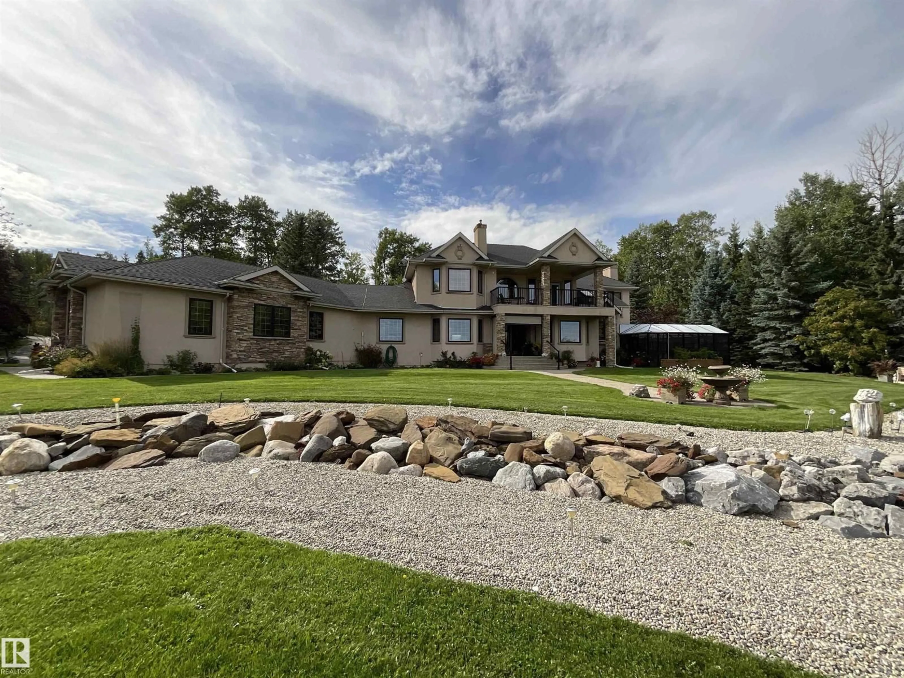 A pic from outside/outdoor area/front of a property/back of a property/a pic from drone, mountain view for 22031 TWP RD 472, Rural Wetaskiwin County Alberta T0C2T0